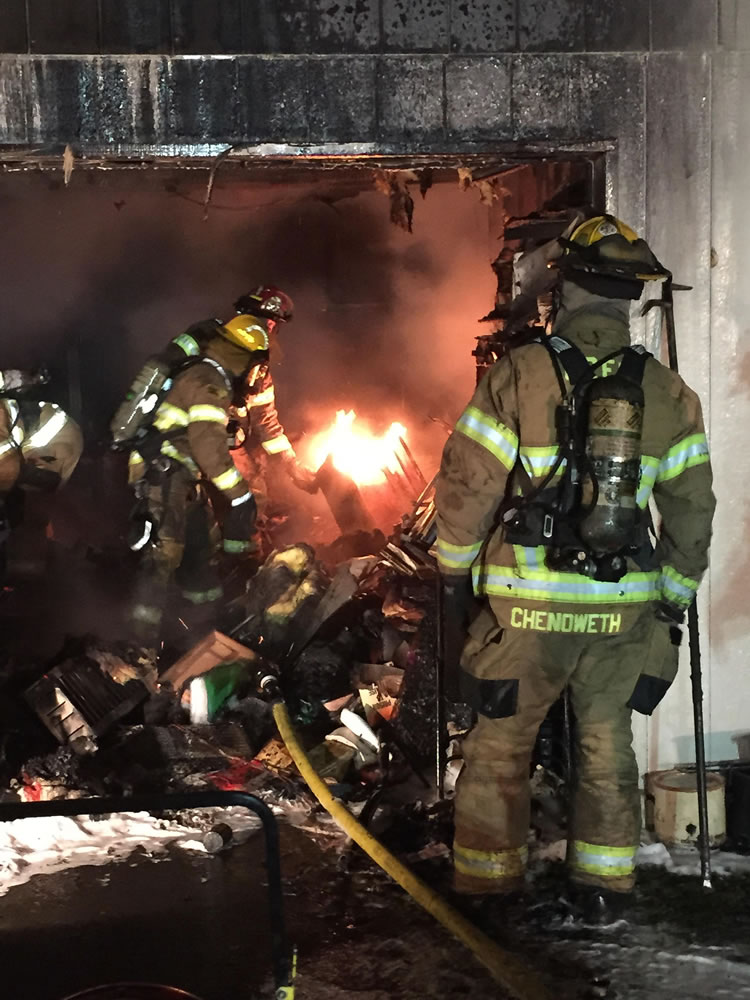 Firefighters from Clark County Fire &amp; Rescue respond early Sunday morning to a blaze inside a two-story outbuilding in La Center.