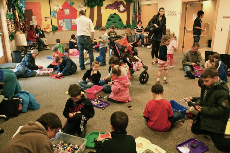 An average of 60 children gather each month at Three Creeks Library's Lego Lovers event.