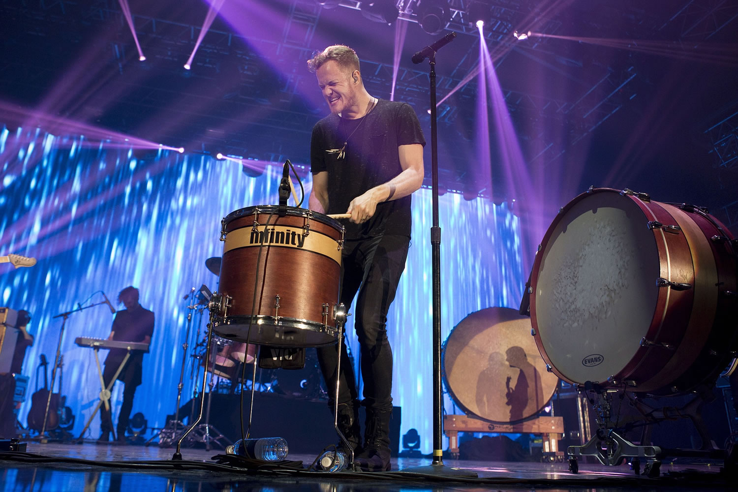 FILE - In this Jan. 31, 2014 file photo, Dan Reynolds of Imagine Dragons performs at The Bud LIght Hotel, in New York. Imagine Dragons set a record last week on the Billboard Hot 100 with the anthemic rock jam, ?Radioactive,? which has spent 77 weeks - and counting - on the chart.