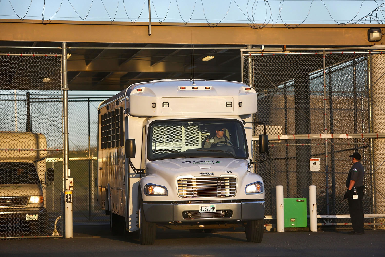 A bus is moved in March 2014 at the privately-run Tacoma Northwest Detention Center in Tacoma.