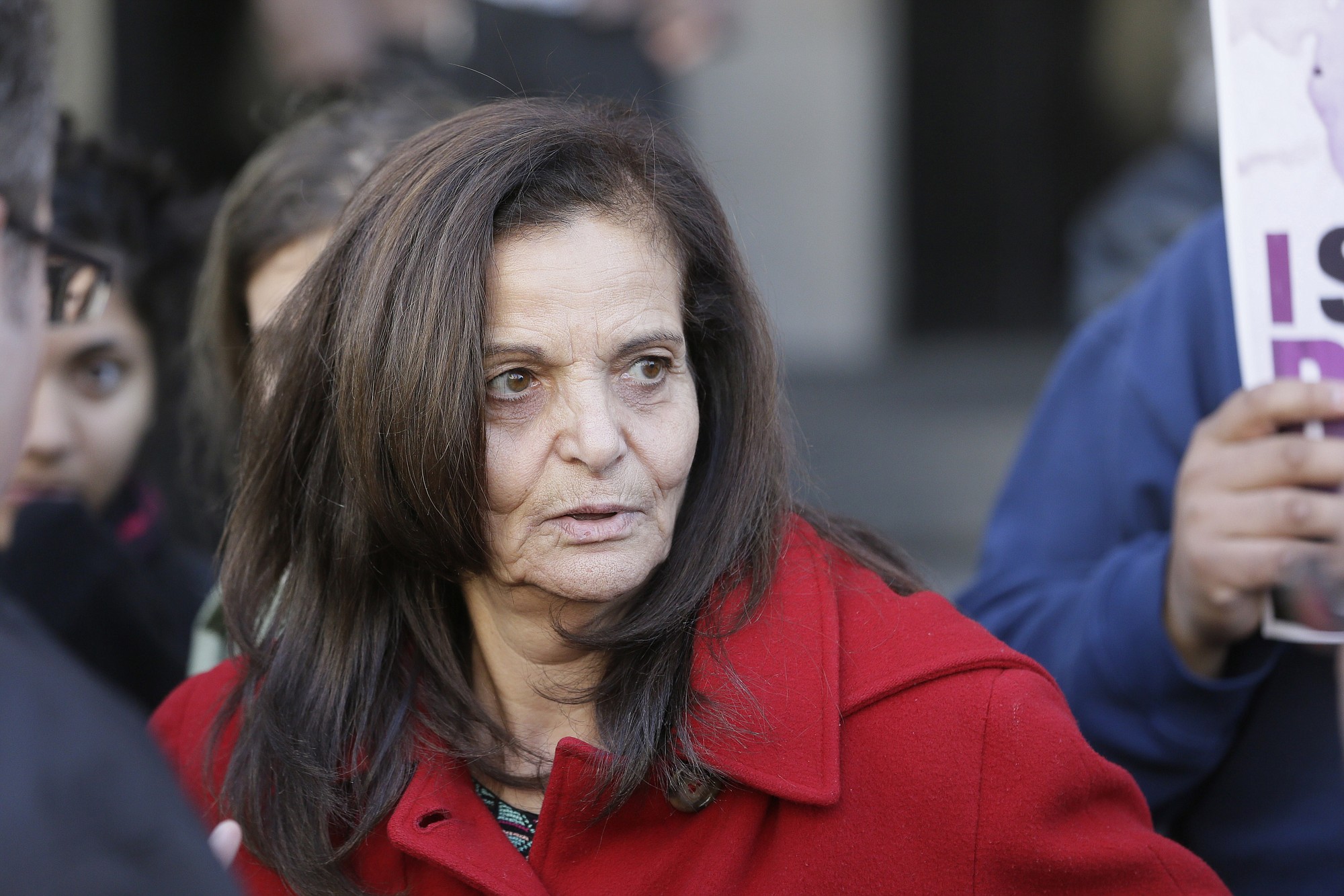 Rasmieh Yousef Odeh, 67, is interviewed outside federal court in Detroit on Monday after the Palestinian immigrant was found guilty of immigration fraud for failing to disclose her conviction and imprisonment in a Jerusalem supermarket bombing that killed two people.