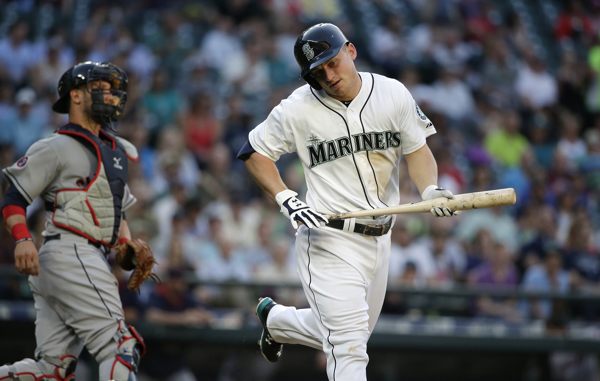 Seattle Mariners' Kyle Seager spins around after striking out to end the third inning against the Cleveland Indians on Thursday, May 28, 2015, in Seattle.