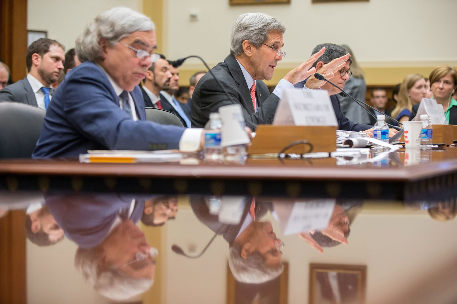 Secretary of State John Kerry, center, flanked by Treasury Secretary Jacob Lew, right, and Energy Secretary Ernest Moniz, testifies on Capitol Hill in Washington on Tuesday before the House Foreign Affairs Committee hearing on the Iran Nuclear Agreement.