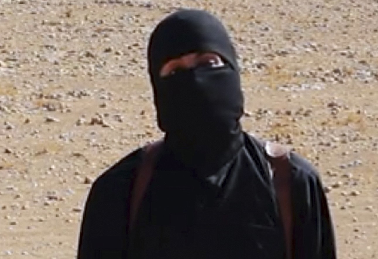 A masked militant seen in beheading videos released by the Islamic State group in Syria over the past few months bears &quot;striking similarities&quot; to a man who grew up in London, a Muslim lobbying group said Thursday Feb. 26, 2015.