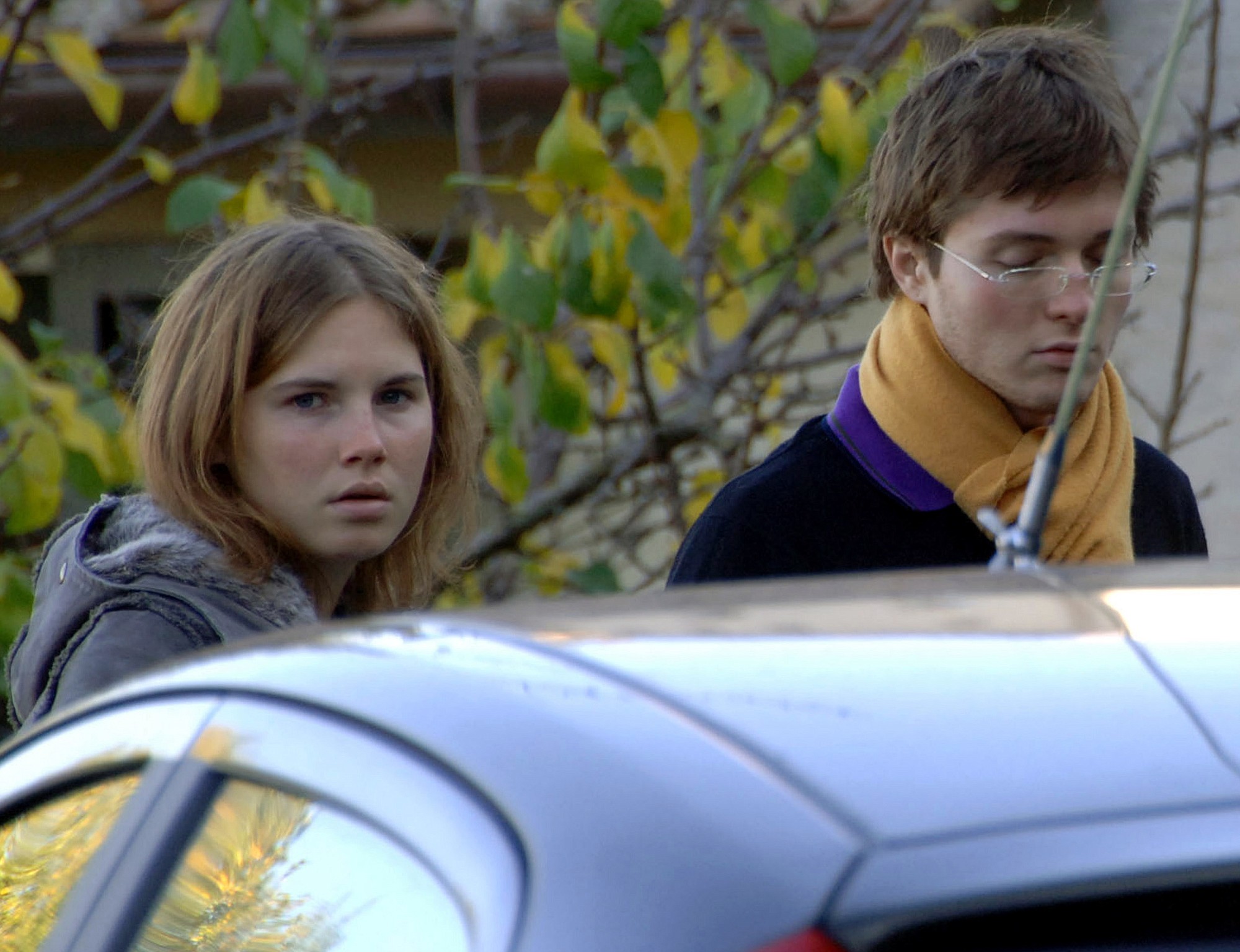 Amanda Knox, left, and Raffaele Sollecito, are seen in November 2007 outside the rented house where 21-year-old British student Meredith Kercher was found dead in Perugia, Italy. The founder of a heavily visited Wiki site about the prosecutions of U.S.