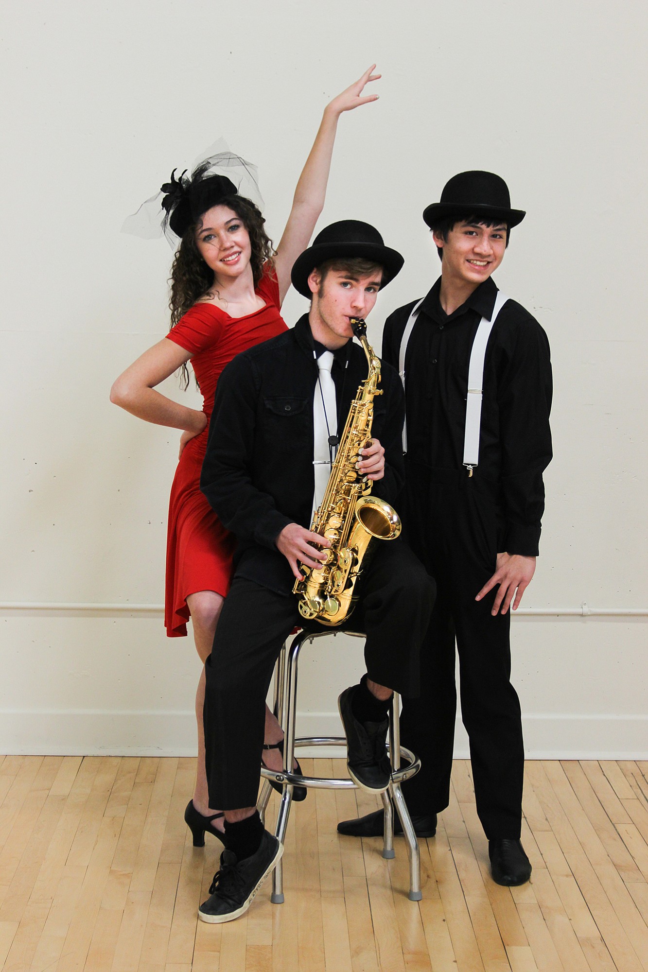 Madison Yinger, Andrew Zacek and Brendan Fairbanks and other Vancouver School of Arts and Academics students perform &quot;Jazzy Nutcracker,&quot; Duke Ellington's &quot;Nutcracker Suite&quot; in the spirit of United Service Organizations Dec.