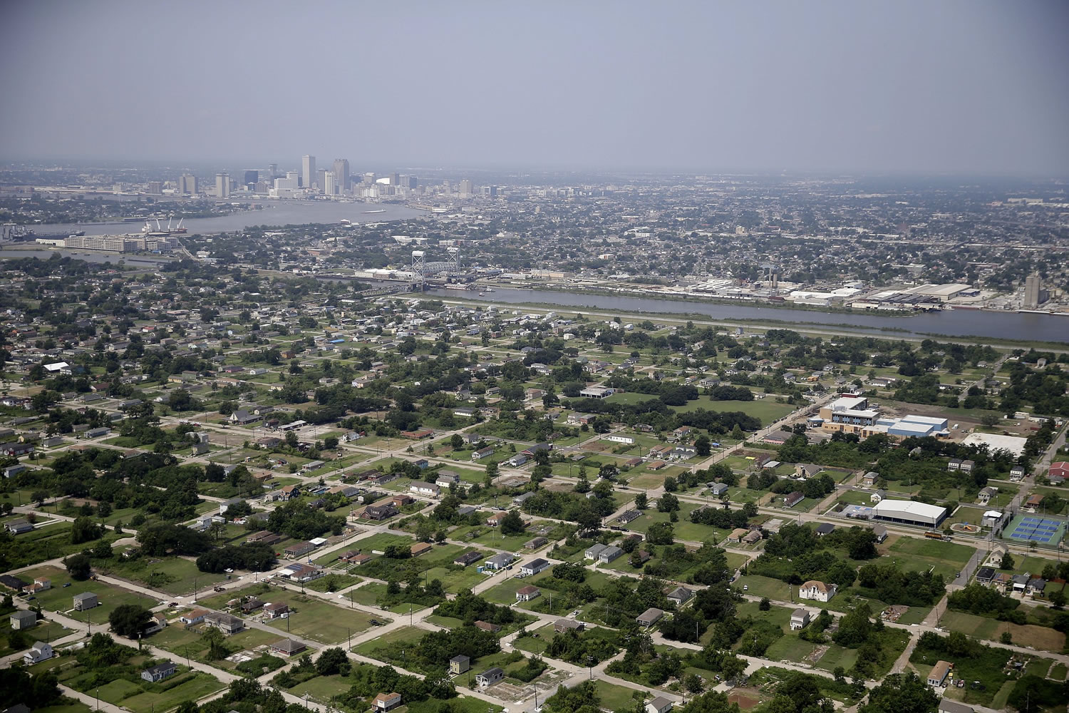 This aerial photo taken July 29 shows empty lots and mostly new buildings, foreground, in the Lower 9th Ward section of New Orleans, which was hardhit by Hurricane Katrina.