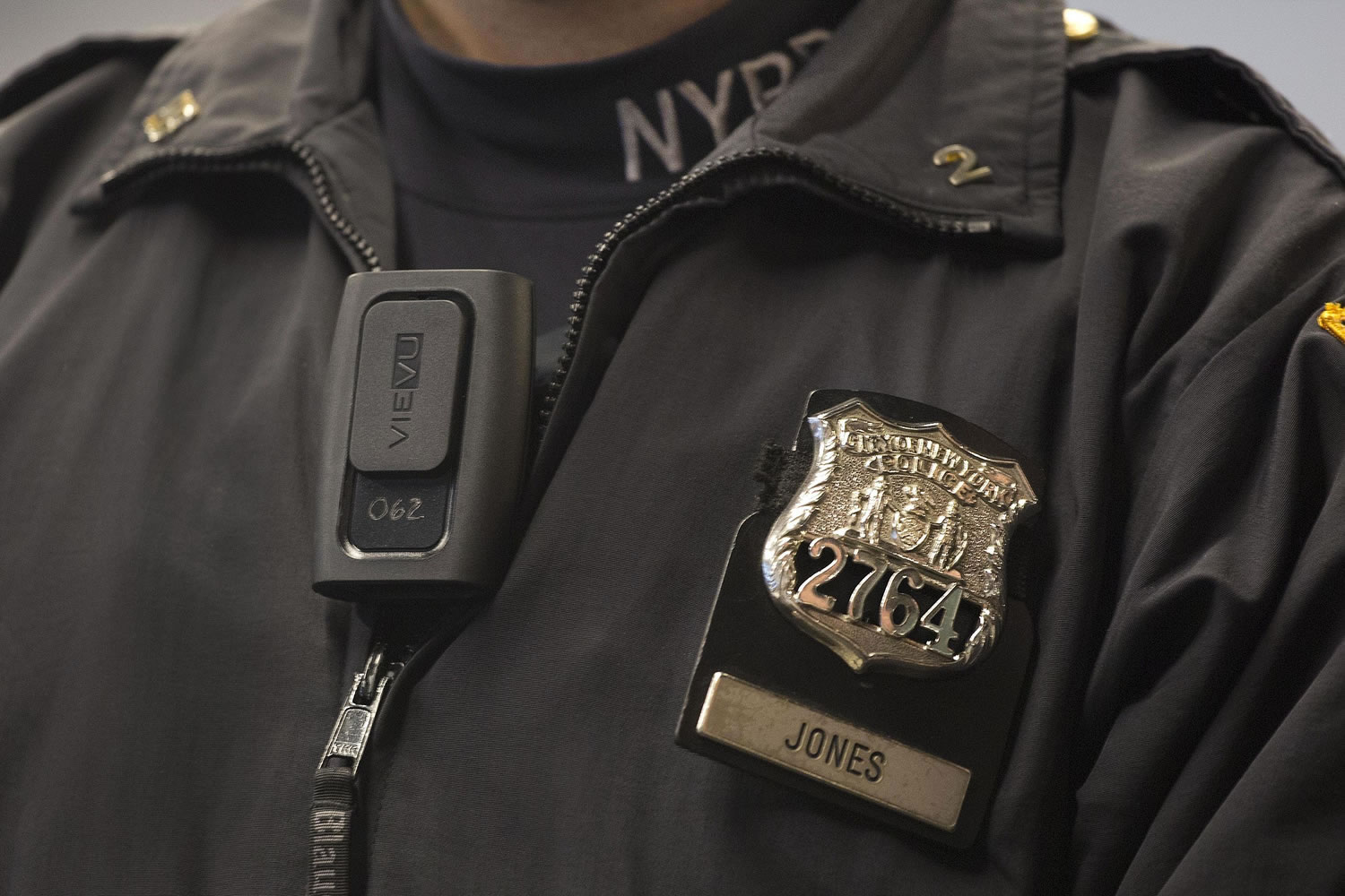 New York Police Department Officer Joshua Jones wears a VieVu body camera on his chest during a news conference in New York.
