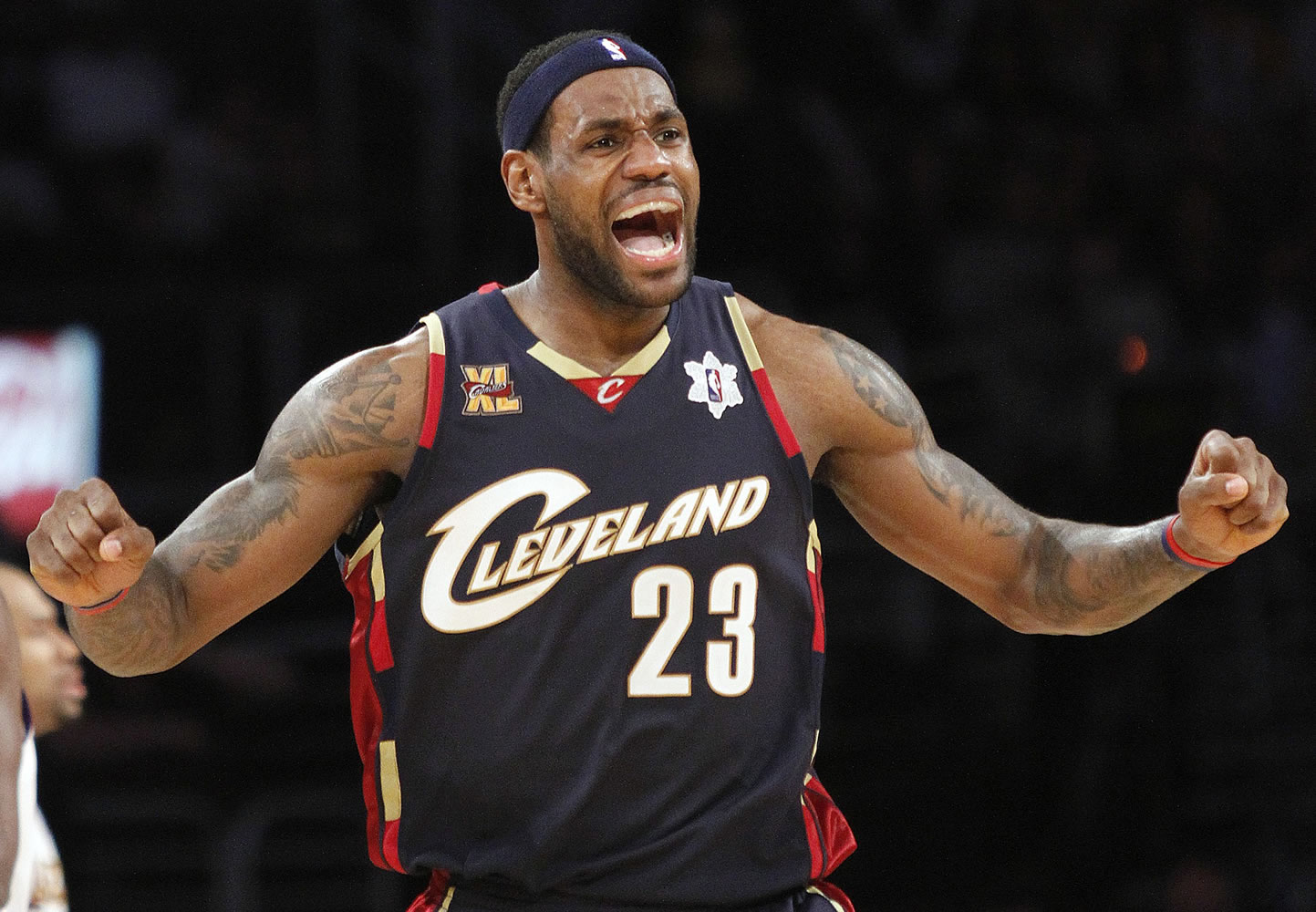 Forward LeBron James reacts during the second half against the Los Angeles Lakers in an NBA basketball game in Los Angeles on  Dec. 25, 2009. The three-team trade that gave the Cleveland Cavaliers salary cap space to possibly land LeBron James is official.