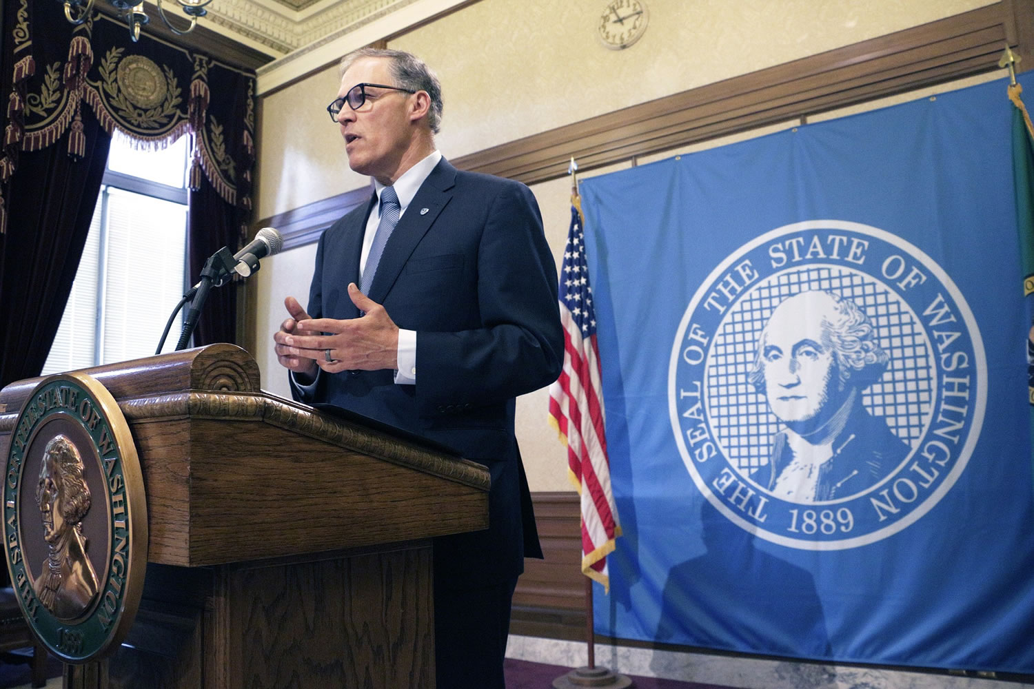Washington Gov. Jay Inslee talks to the media about the status of ongoing state budget negotiations, Friday, June 19, 2015, in Olympia, Wash. Inslee says new taxes are off the table, and he encouraged the House and Senate to consider closing some tax exemptions as a compromise.