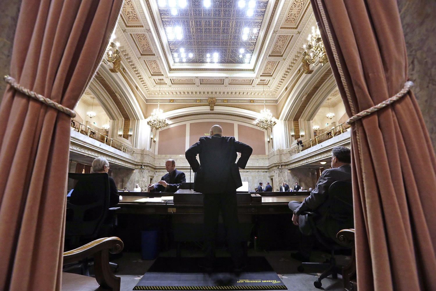 House Speaker Pro Tempore Jim Moeller, D-Vancouver, looks out over the House Chamber moments before the start of a 30-day special session of the Legislature on April 29 in Olympia.