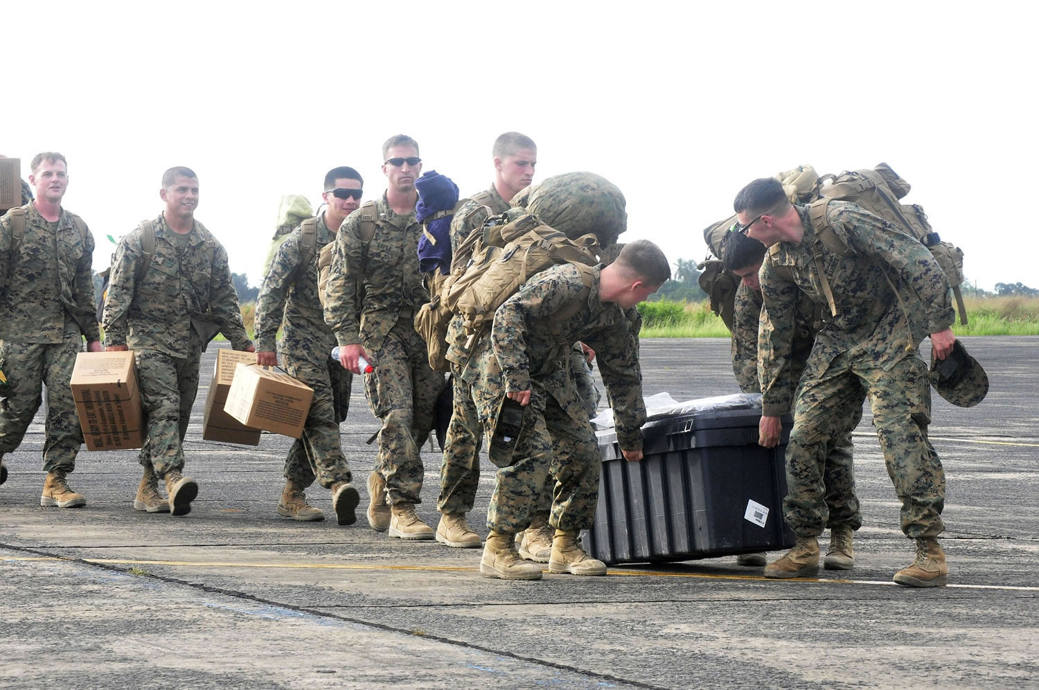 U.S. Marines arrive Thursday at Roberts International airport in Monrovia, Liberia. Six U.S.