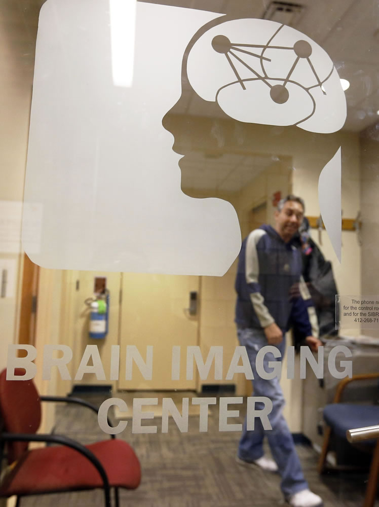 Scott Kurdilla, a medical research technologist at Carnegie Mellon University, waits for a volunteer for a brain scan Wednesday on campus in Pittsburgh. The brain-scanning MRI machine at the center was used in a recent experiment where each word of a chapter of &quot;Harry Potter and the Sorcerer's Stone&quot; was flashed for half a second onto a screen inside a brain-scanning MRI machine.