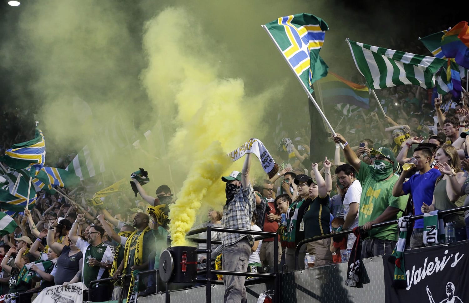 Portland Timbers fans celebrate after a goal during the second half of an MLS soccer game against the Houston Dynamo.