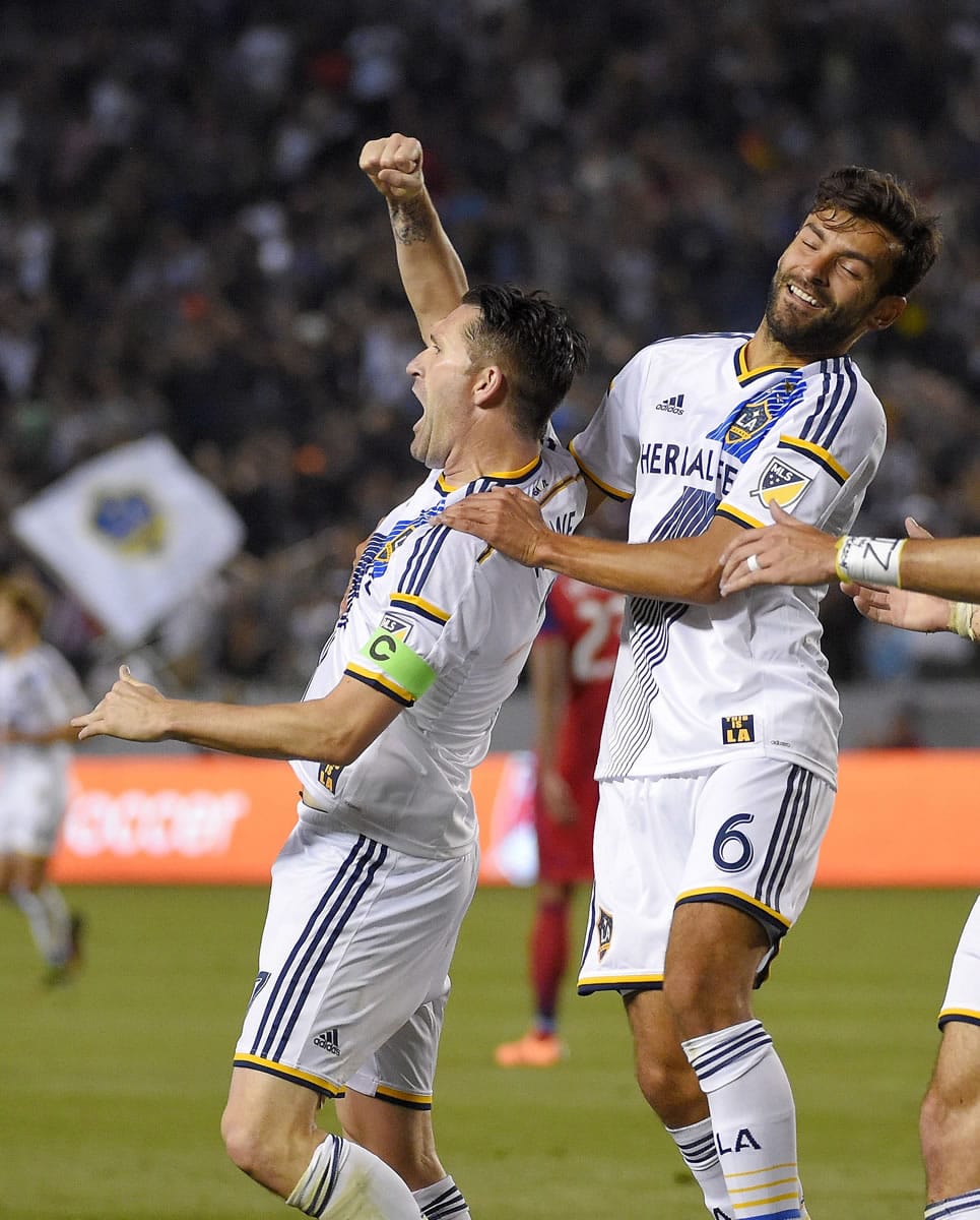 Los Angeles forward Robbie Keane, left, celebrates after scoring, with midfielder Baggio Husidic during the second half against Chicago on March 6.