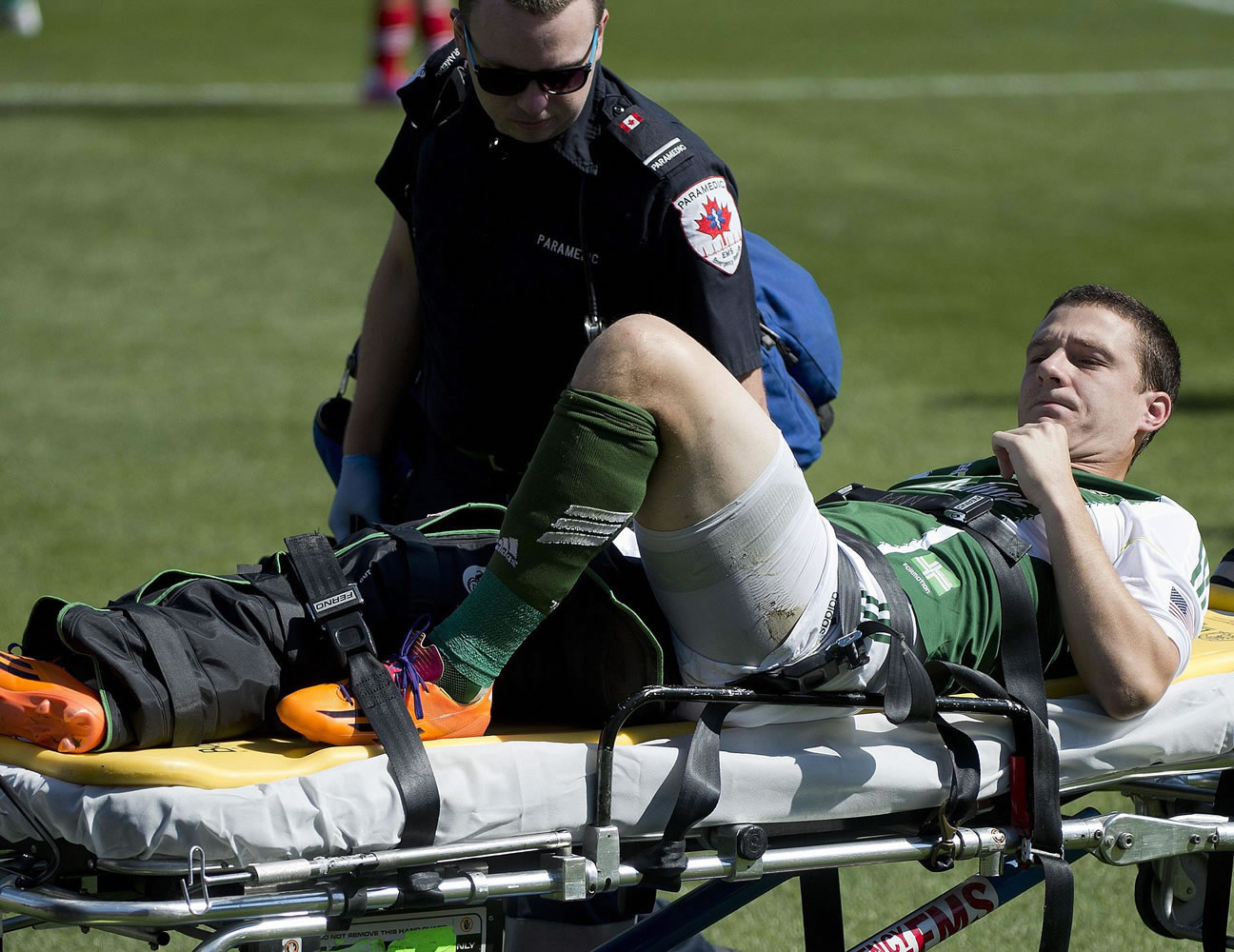 Portland Timbers midfielder Will Johnson is carted off the field on a stretcher after getting injured in the first half  against Toronto FC on Sept. 27, 2014.