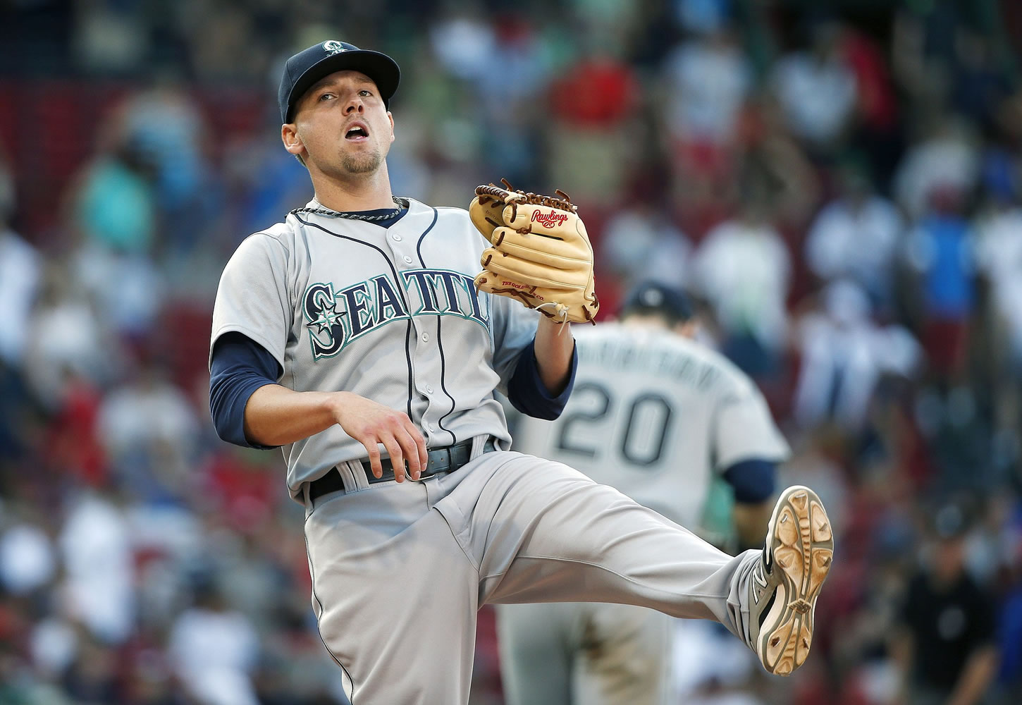 Seattle Mariners' Danny Farquhar reacts after making the ground out on Boston Red Sox's Jackie Bradley Jr. to end the game in the 12th inning Sunday.
