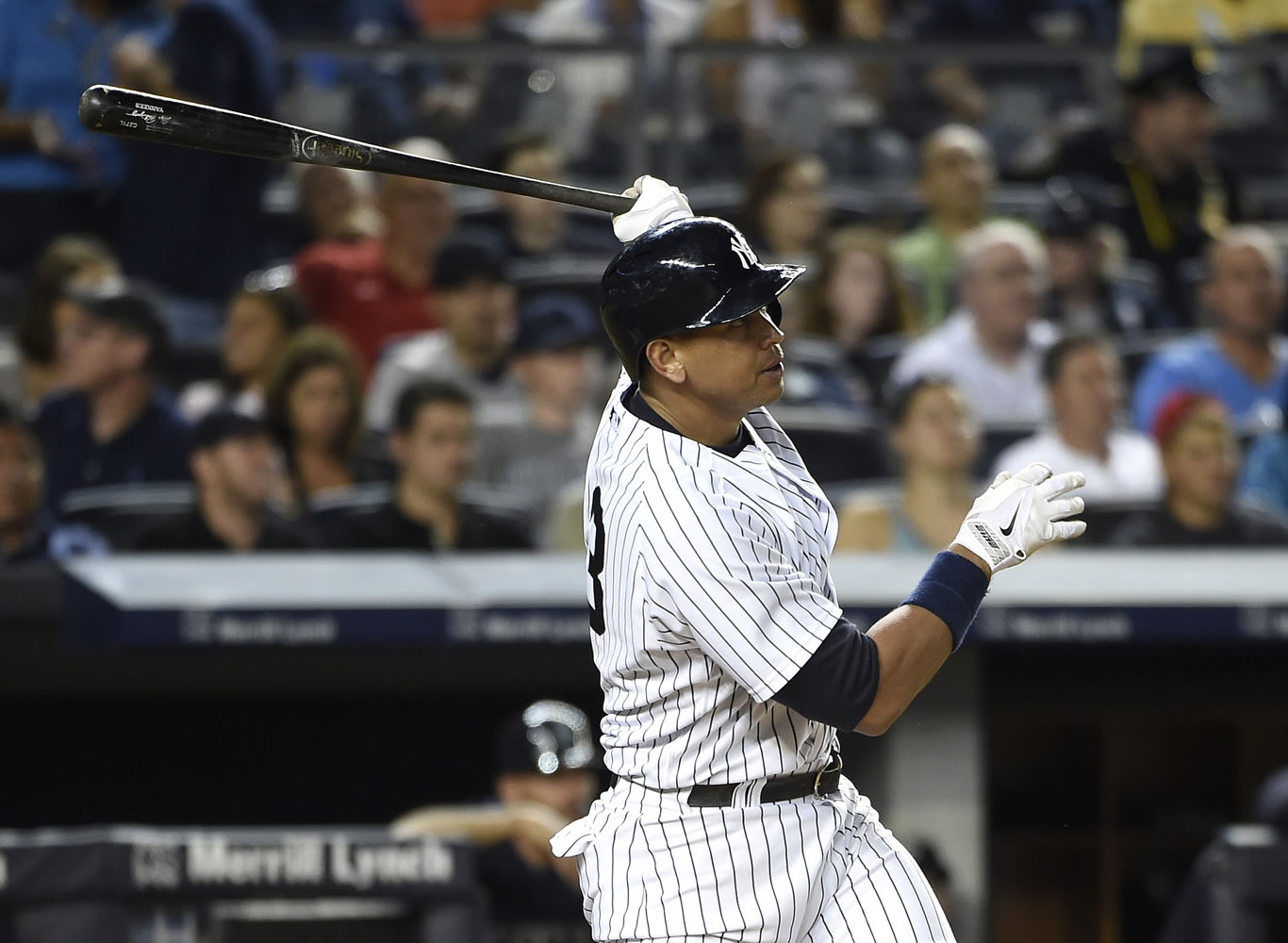 New York Yankees designated hitter Alex Rodriguez watches his solo home run off Seattle Mariners relief pitcher Joe Beimel during the seventh inning at Yankee Stadium on Friday, July 17, 2015, in New York.