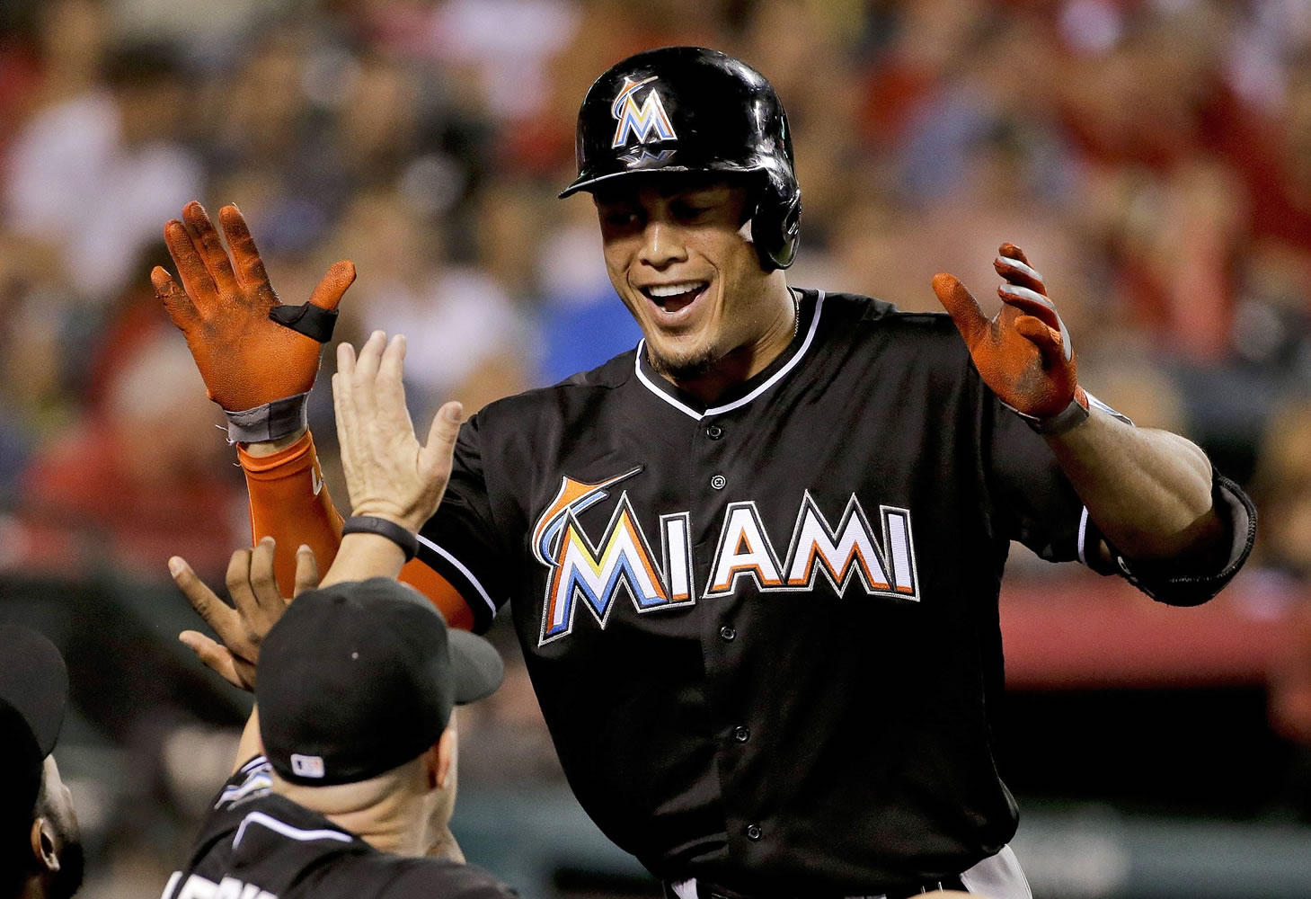 Miami Marlins' Giancarlo Stanton has agreed to terms with the team on a $325 million, 13-year contract. It's the most lucrative deal for an American athlete.