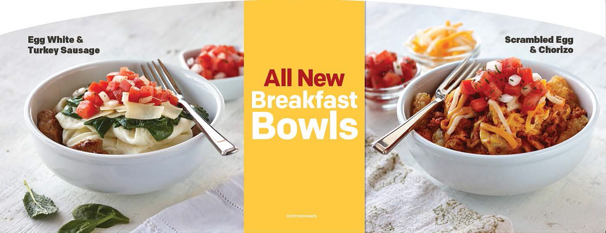 This product image provided by McDonald's advertises the restaurant chain's new breakfast bowls, including Egg White and Turkey Sausage, which contains kale, left, and Scrambled Egg and Chorizo.