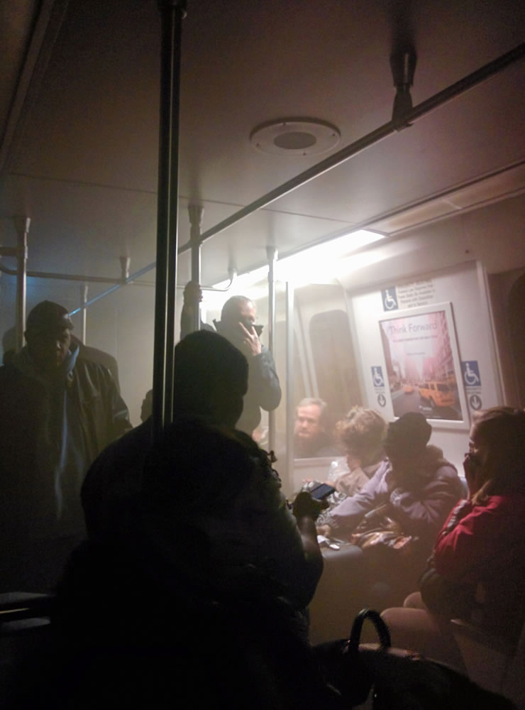 Smoke fills a Washington Metro system subway car near the L'Enfant Plaza station Monday in Washington.