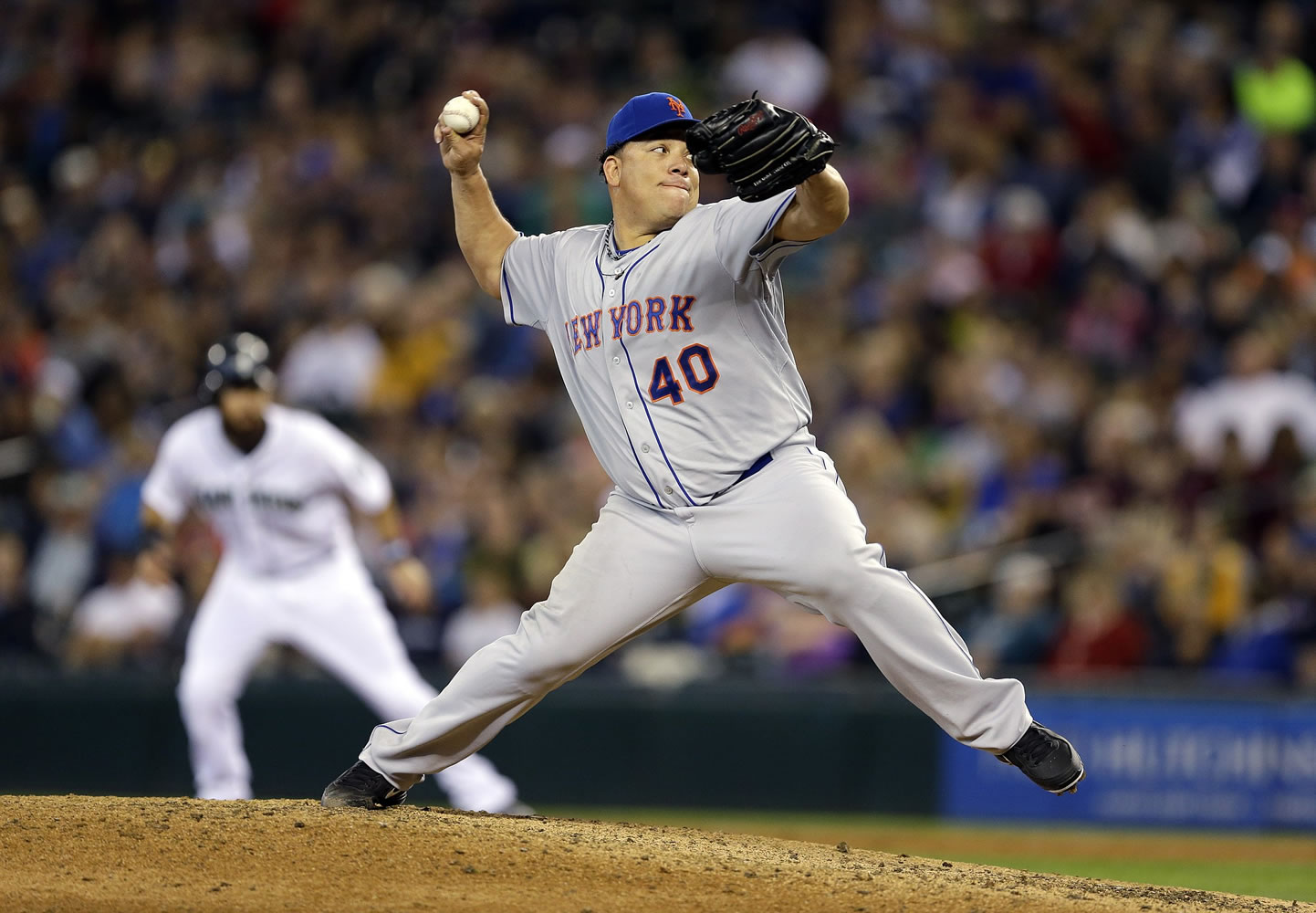 New York Mets starting pitcher Bartolo Colon throws in the eighth inning against the Seattle Mariners on Wednesday.