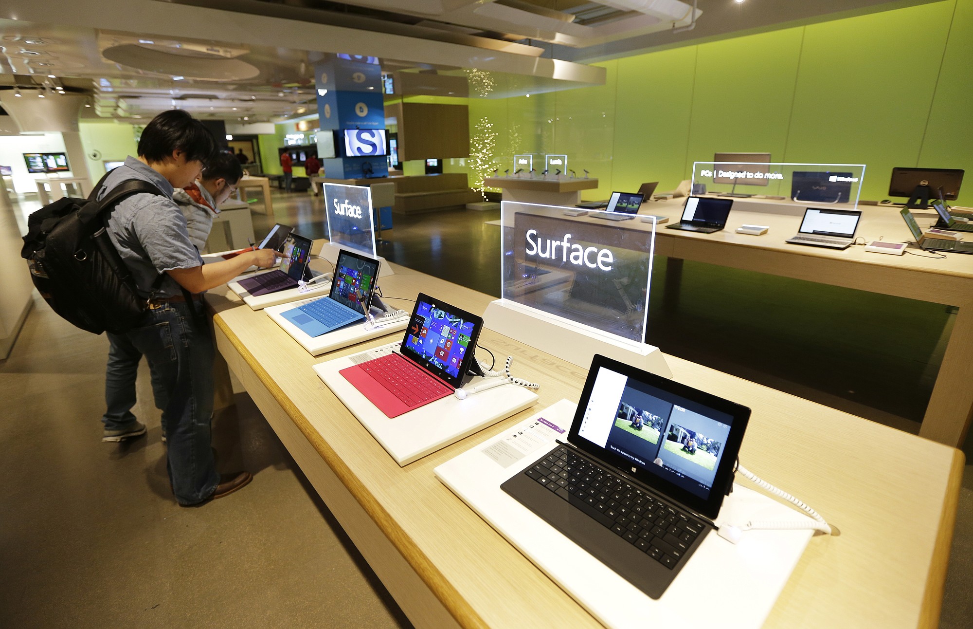Microsoft Surface tablet computers are displayed at the Microsoft Visitor Center in Redmond.