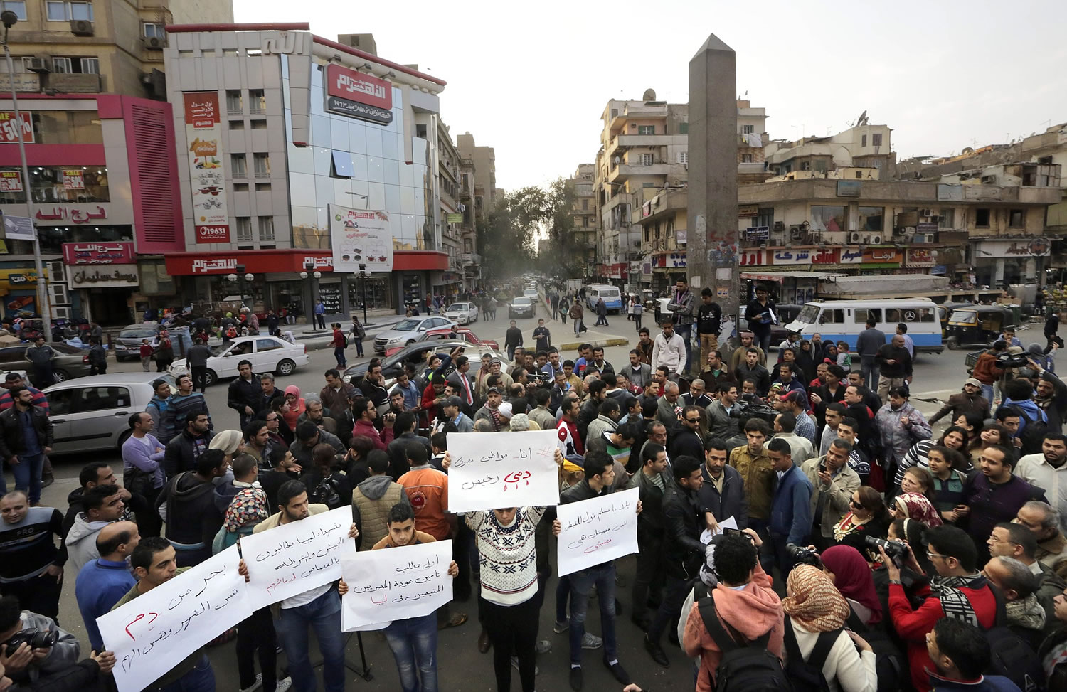 Egyptians, mostly Christians chant slogans during a protest against Egyptian Coptic Christians who were captured in Libya and killed by militants affiliated with the Islamic State group, in Cairo, Egypt, on Monday.