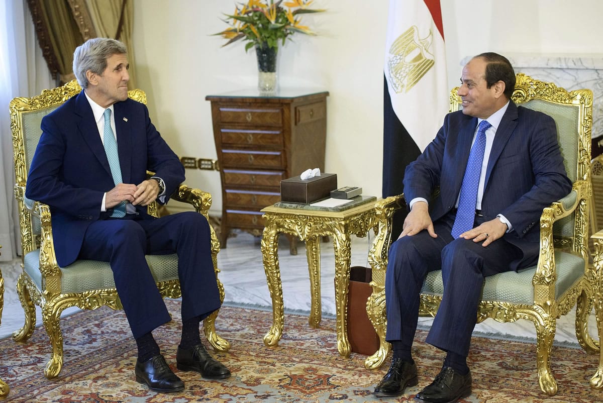 Secretary of State John Kerry, left, and Egyptian President Abdel-Fattah el-Sissi sit before their meeting Sunday at the presidential palace in Cairo.