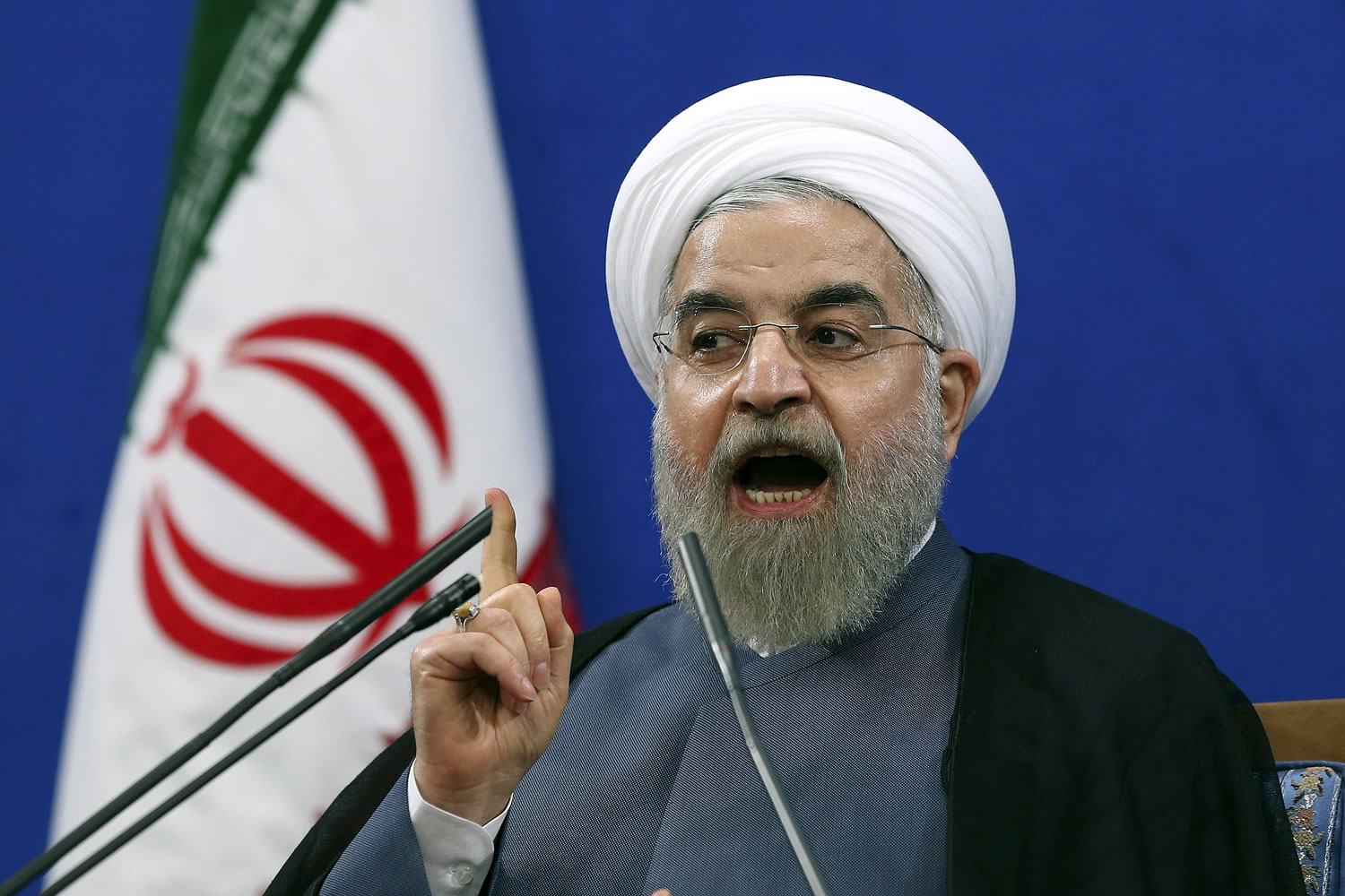 Iranian President Hassan Rouhani speaks during a press conference on the second anniversary of his election, in Tehran, Iran, Saturday,.
