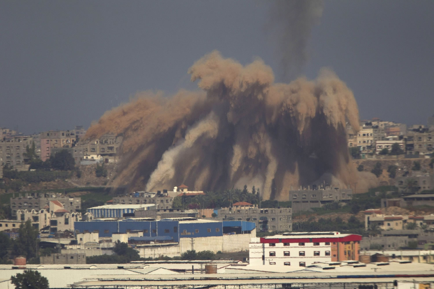 Smoke and debris rise after an Israeli airstrike on the Gaza Strip on Wednesday.