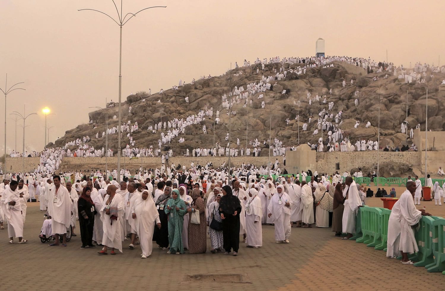 Pilgrims climb the Jabal Arafat holy mountain during the annual pilgrimage, known as the hajj, Thursday near Mecca, Saudi Arabia.