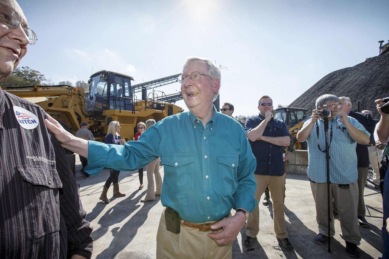 Senate Minority Leader Mitch McConnell of Kentucky, a 30-year incumbent, greets people Monday at a coal tipple operation in Manchester, Ky.