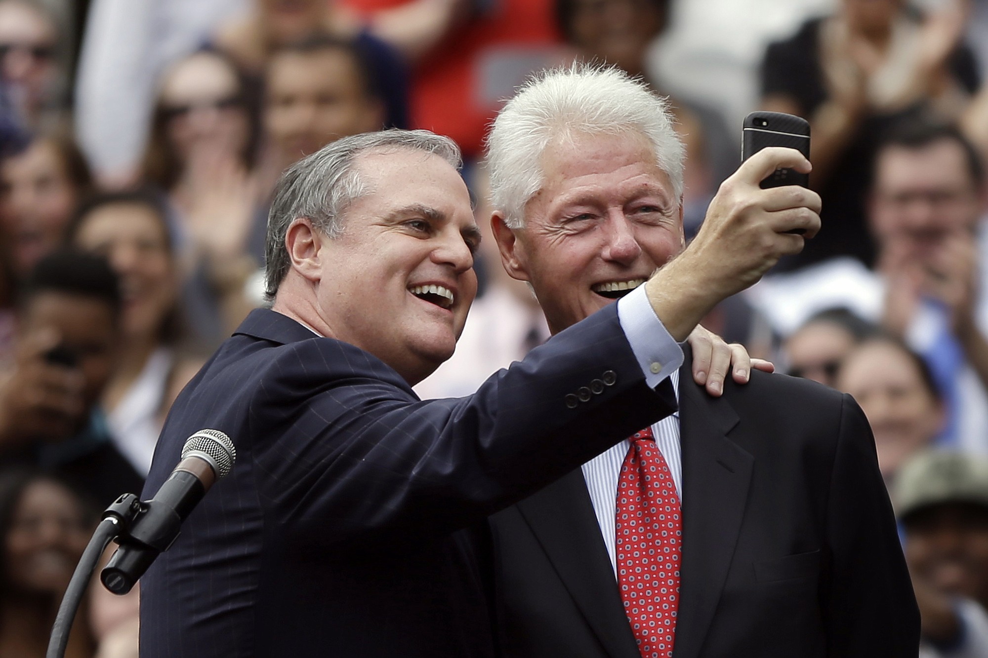 Sen. Mark Pryor, D-Ark., takes a selfie with former President Bill Clinton at a political rally Oct.
