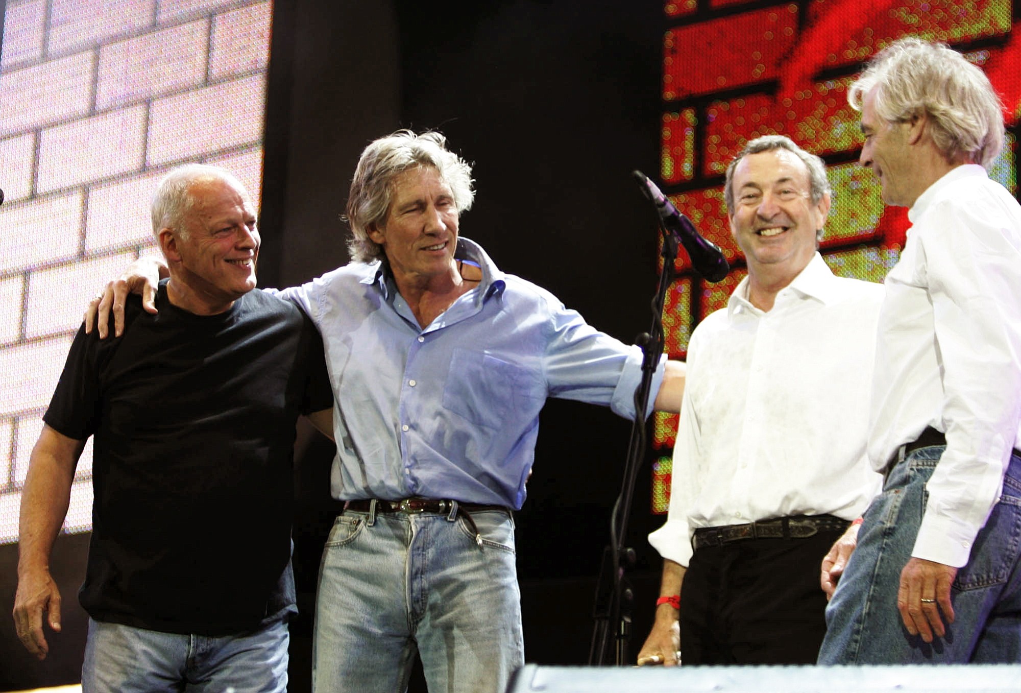 Associated Press files
Pink Floyd's Dave Gilmore, from left, Roger Waters, Nick Mason and Rick Wright appear on stage in 2005 at the end of their set at the Live 8 concert in Hyde Park, London.