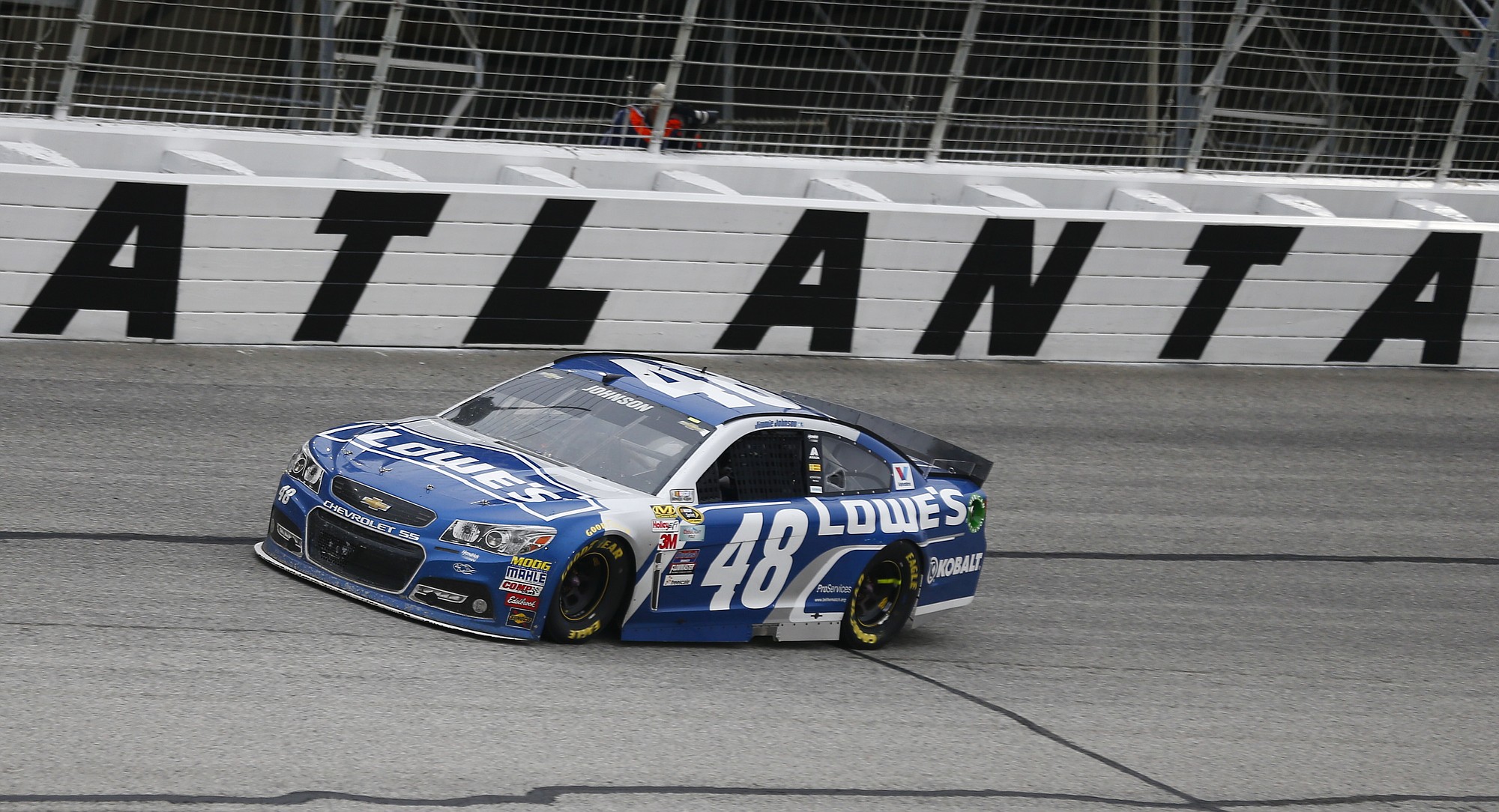 Jimmie Johnson (48) drives through Turn 4 during the NASCAR Sprint Cup series auto race at Atlanta Motor Speedway, Sunday, March 1, 2015, in Hampton, Ga.