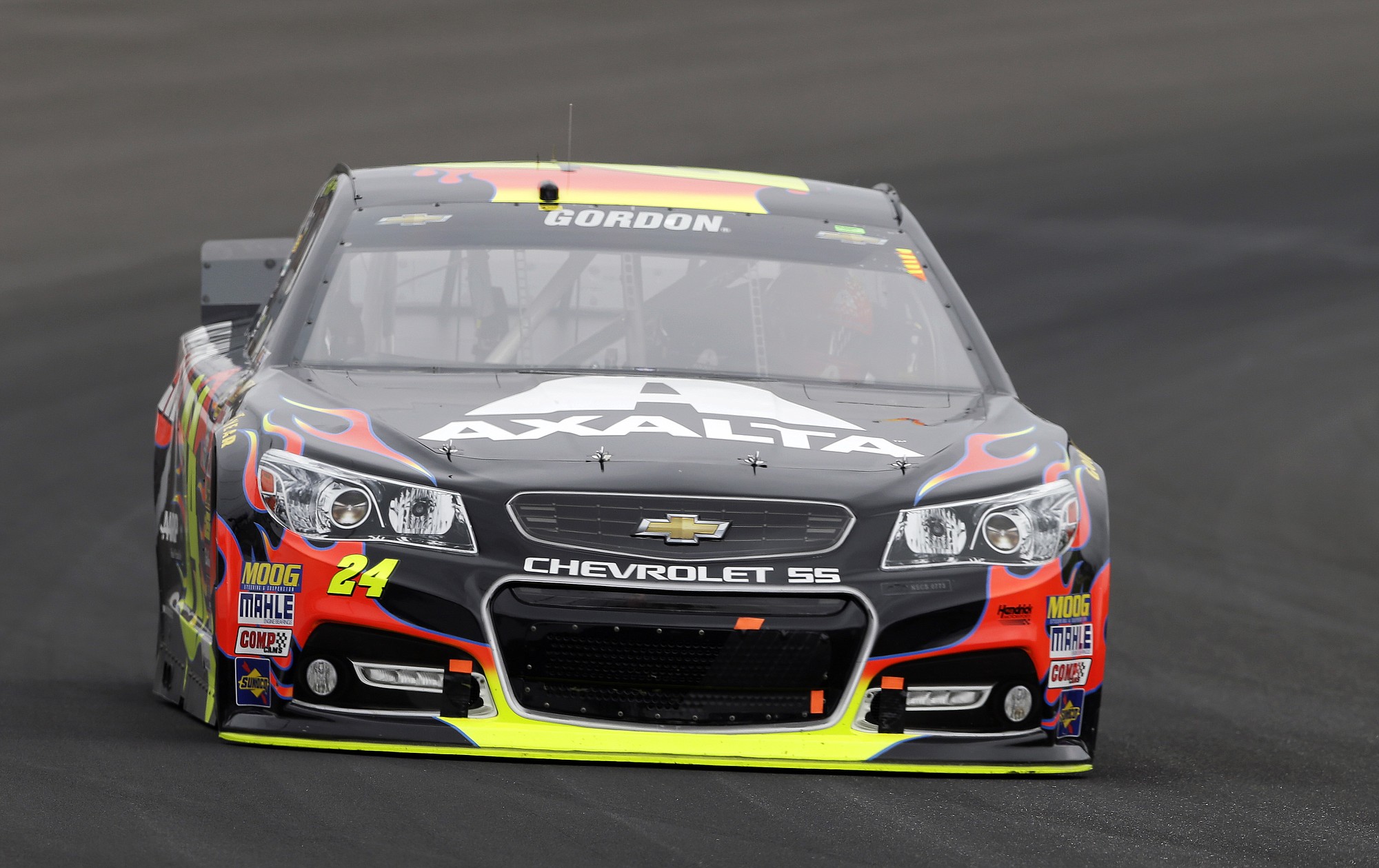 Jeff Gordon drives through Turn 1 during the Brickyard 400 auto race at Indianapolis Motor Speedway in Indianapolis, Sunday, July 27, 2014.