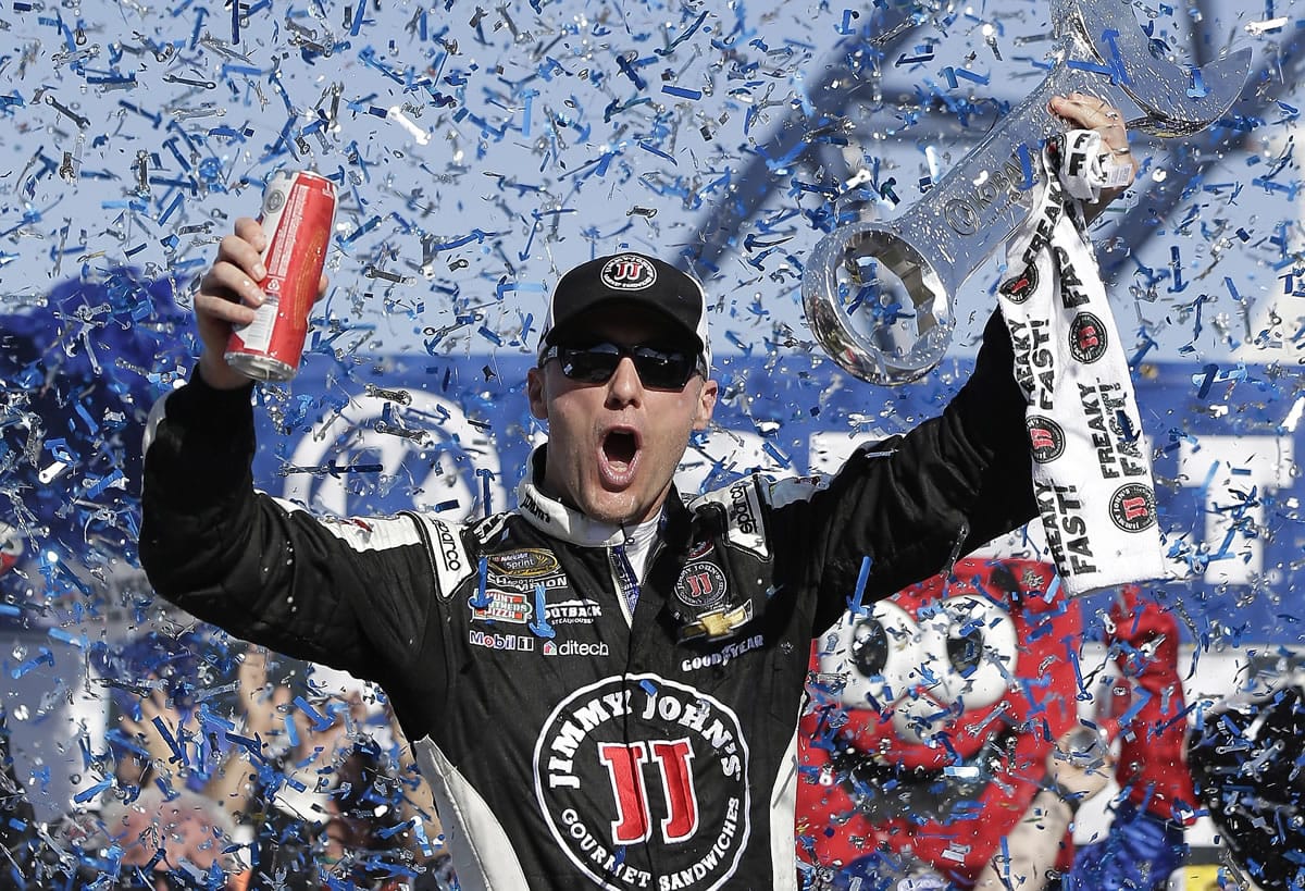 Kevin Harvick celebrates in Victory Lane after winning a NASCAR Sprint Cup series auto race Sunday, March 8, 2015, in Las Vegas.