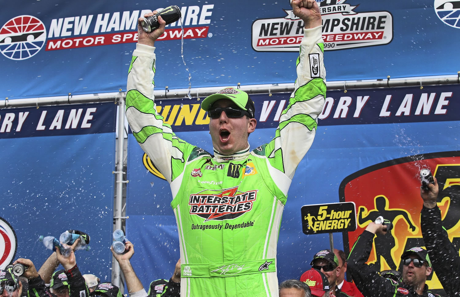 Kyle Busch celebrates in Victory Lane after winning the NASCAR Sprint Cup series auto race at New Hampshire Motor Speedway in Loudon, N.H., on Sunday, July 19, 2015.