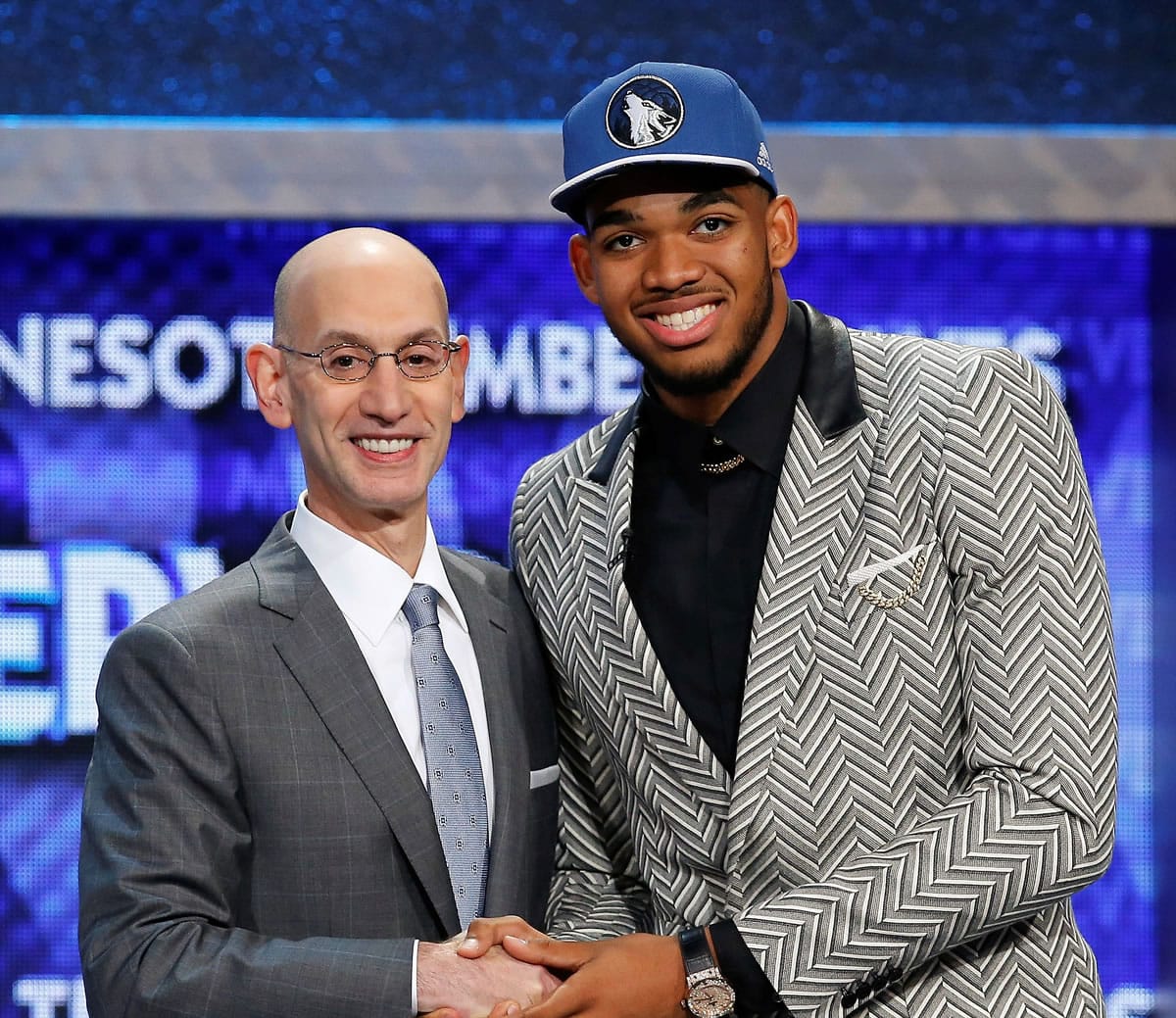 Karl-Anthony Towns, right, poses for a photo with NBA Commissioner Adam Silver after being announced as the top pick during the NBA draft by the Minnesota Timberwolves, Thursday, June 25, 2015, in New York.