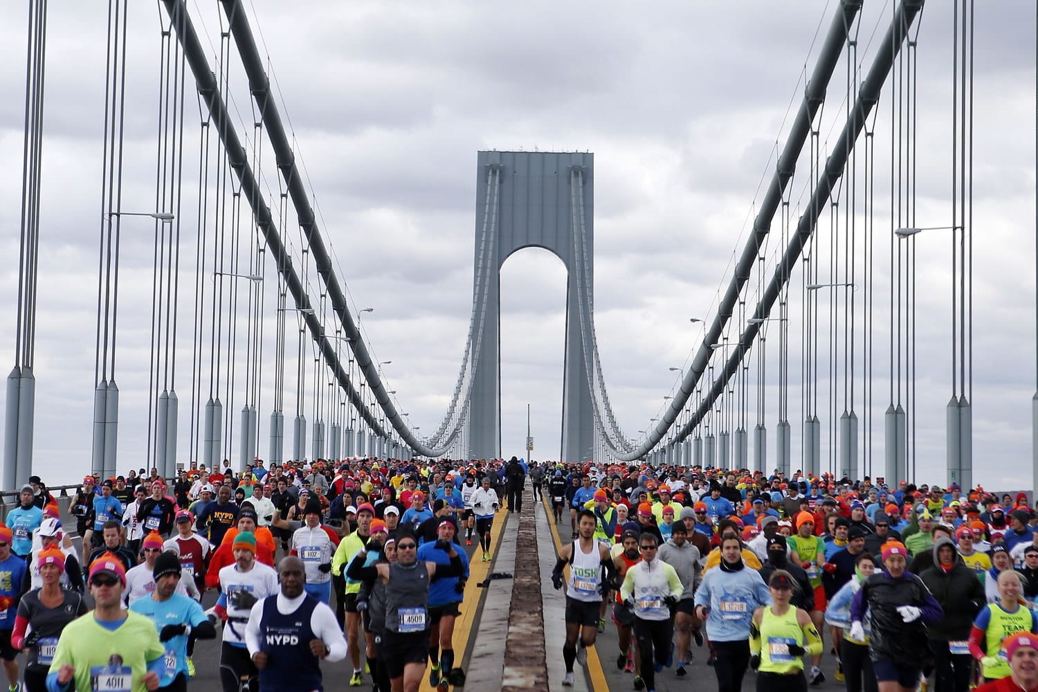 Runners cross the Verrazano-Narrows Bridge at the start of the New York City Marathon, Sunday, Nov.