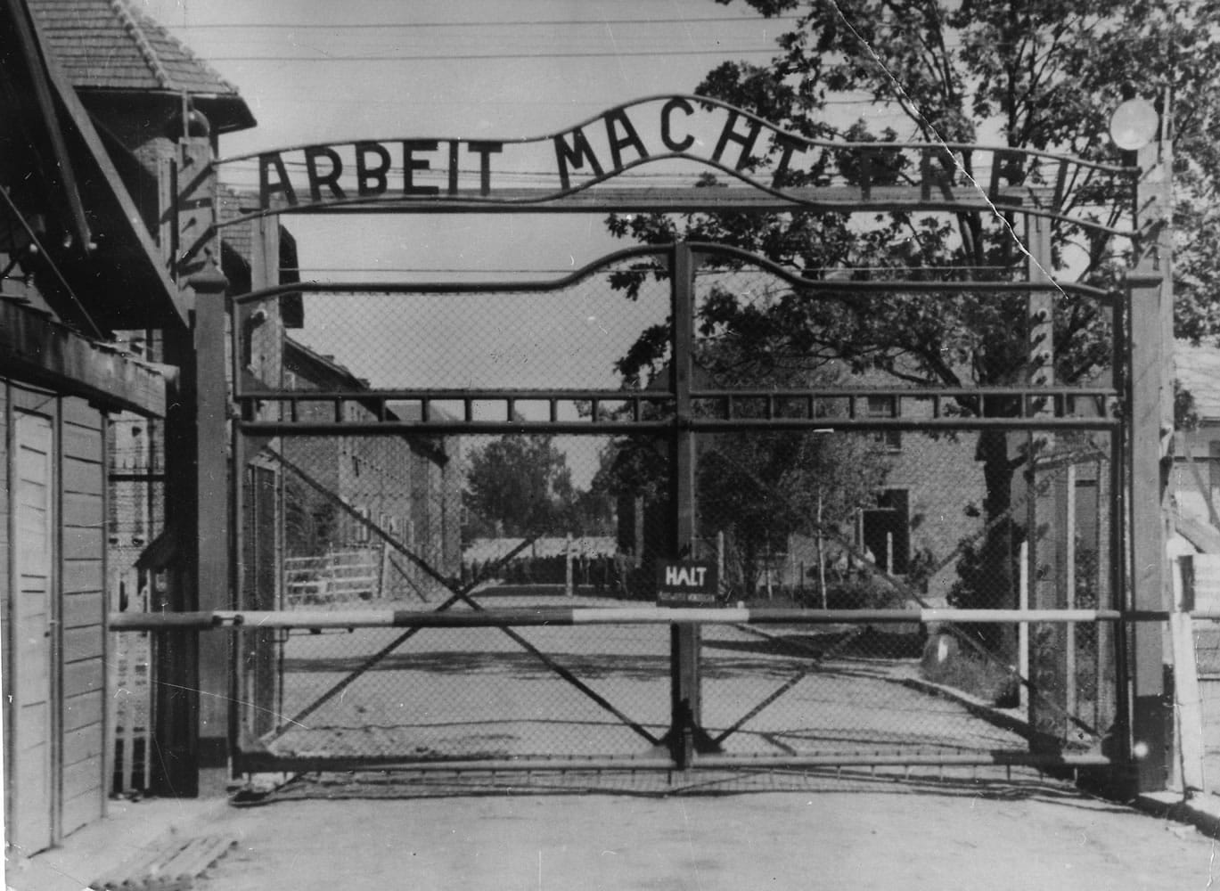 The main gate of the Nazi concentration camp Auschwitz I, Poland, which was liberated by the Russians in January 1945. Writing over the gate reads: u201cArbeit macht freiu201d (Work makes free u2014 or work liberates).