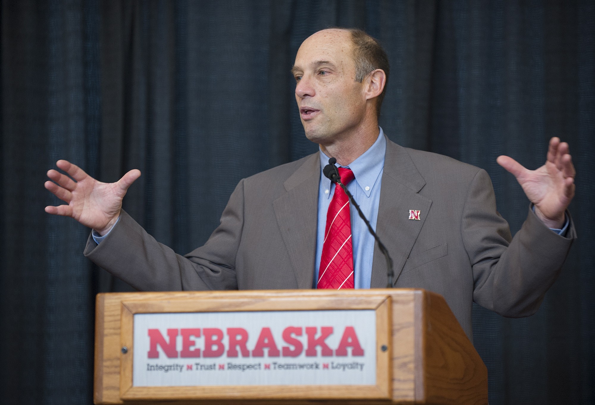 Nebraska's new football coach Mike Riley addresses the media during a news conference at Memorial Stadium on Friday, Dec. 5, 2014 in Lincoln, Neb. Riley, who came from Oregon State, replaces Bo Pelini who was fired last Sunday.