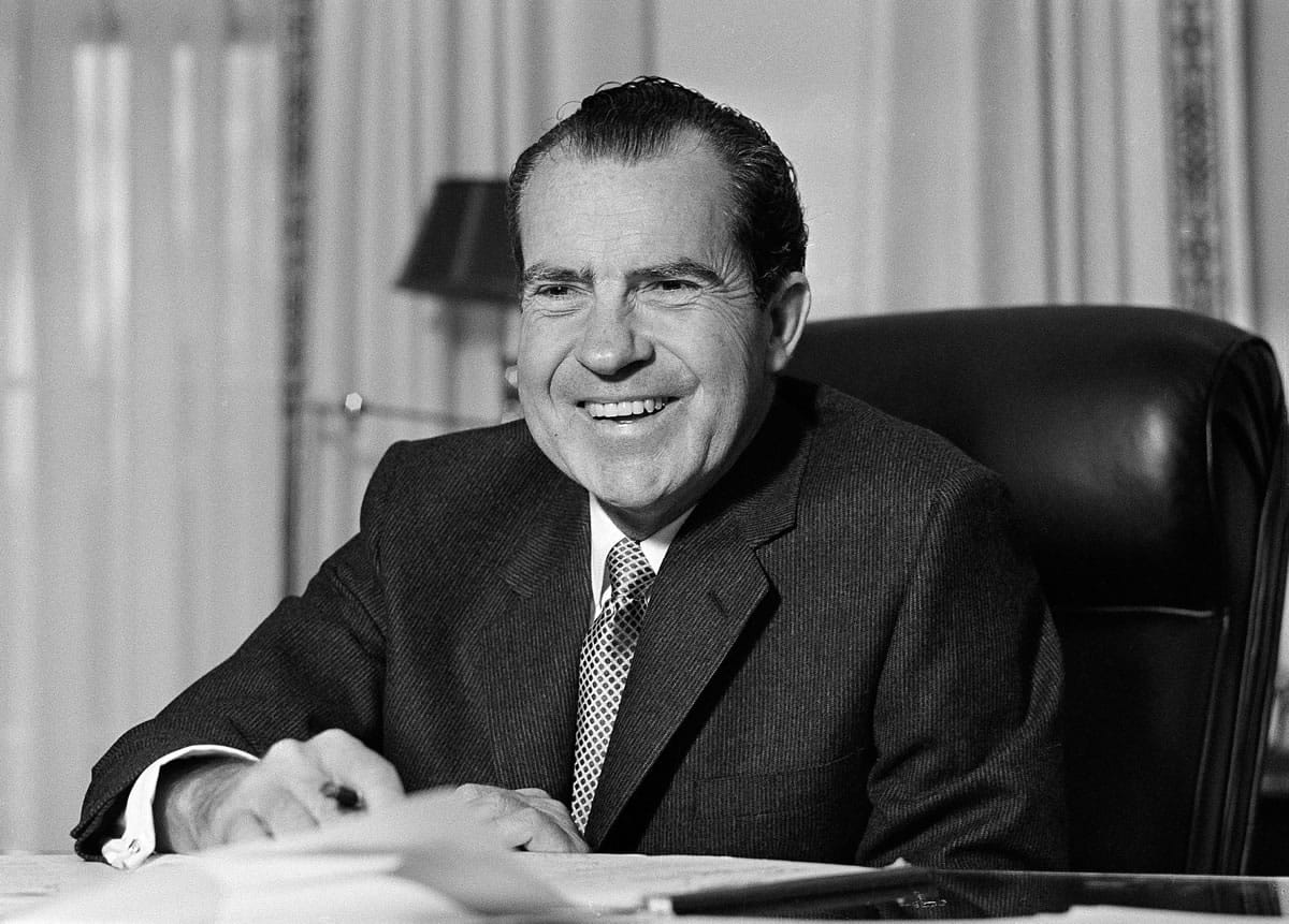 Associated Press files
President Richard Nixon sits at his desk Jan. 21, 1969, at the White House. Today is the 40th anniversary of his resignation.