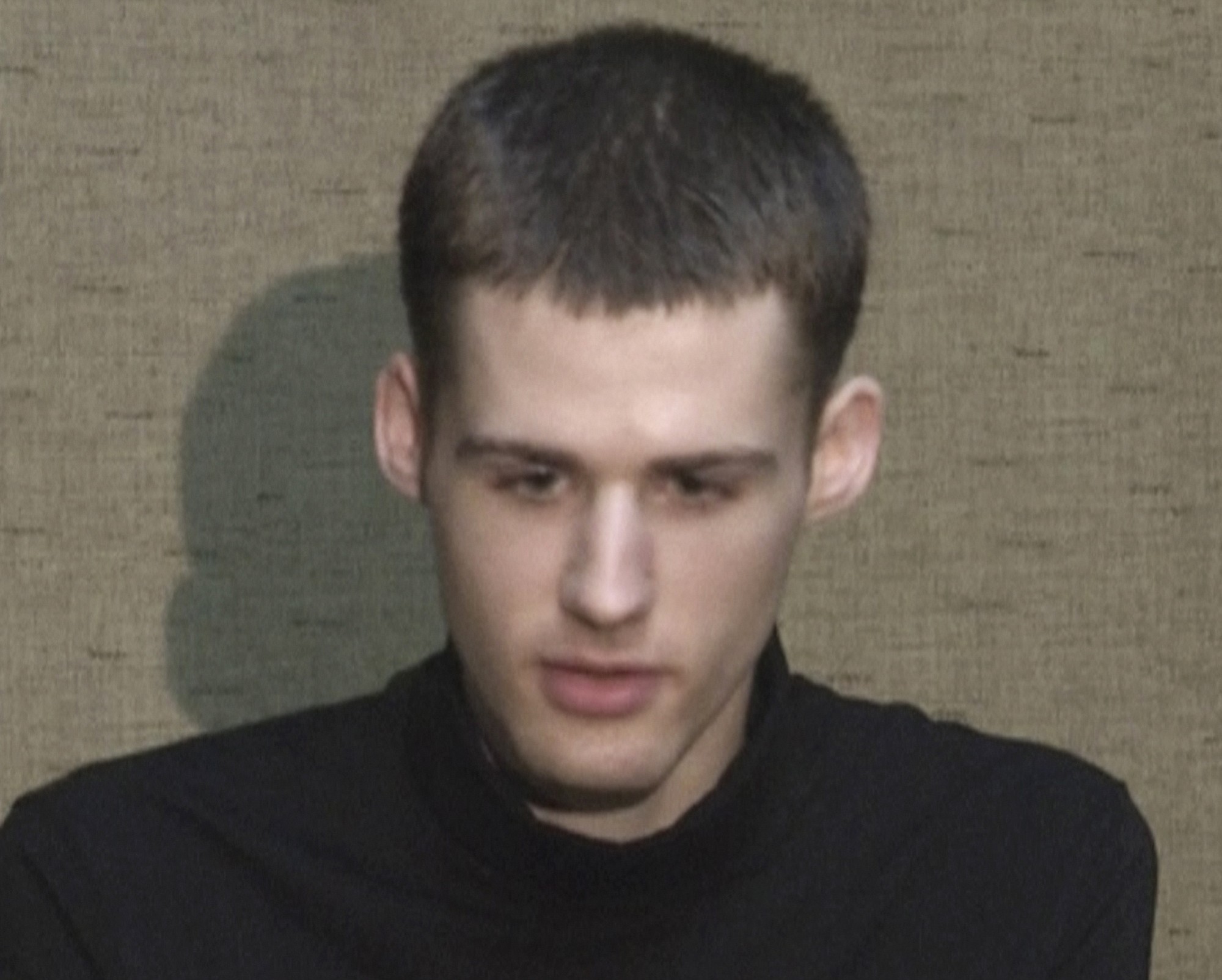 In this image taken from video, U.S. citizen Matthew Todd Miller speaks at an undisclosed location in North Korea Friday, Aug. 1, 2014. Two Americans, Miller and Jeffrey Edward Fowle, charged with ?anti-state? crimes in North Korea say in a video that they expect to be tried soon and possibly receive long prison terms, and appeal for help from the U.S. government. They made the comments in the video shot by a local AP Television News crew. The crew was taken to a location to meet the detained Americans after repeated requests to North Korean authorities to see them.