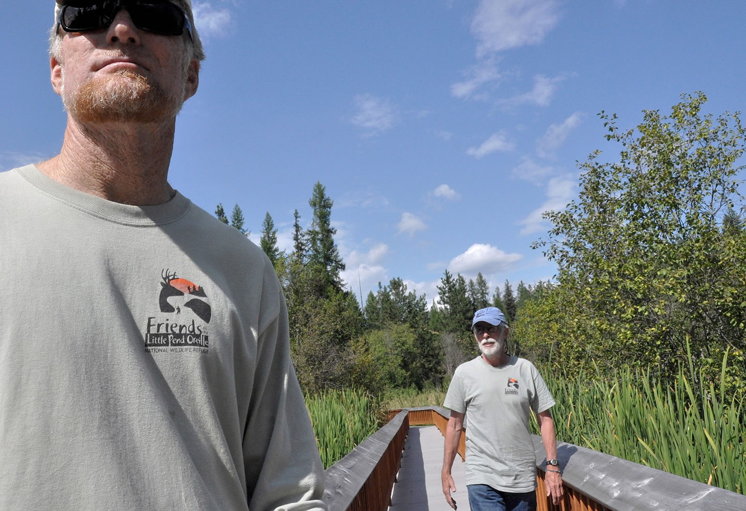 Volunteers Rick Moore, left, and Joel Anderson of the Friends of the Little Pend Oreille National Wildlife Refuge helped build the boardwalk on the McDowell Marsh Environmental Education Trail in Colville in August.