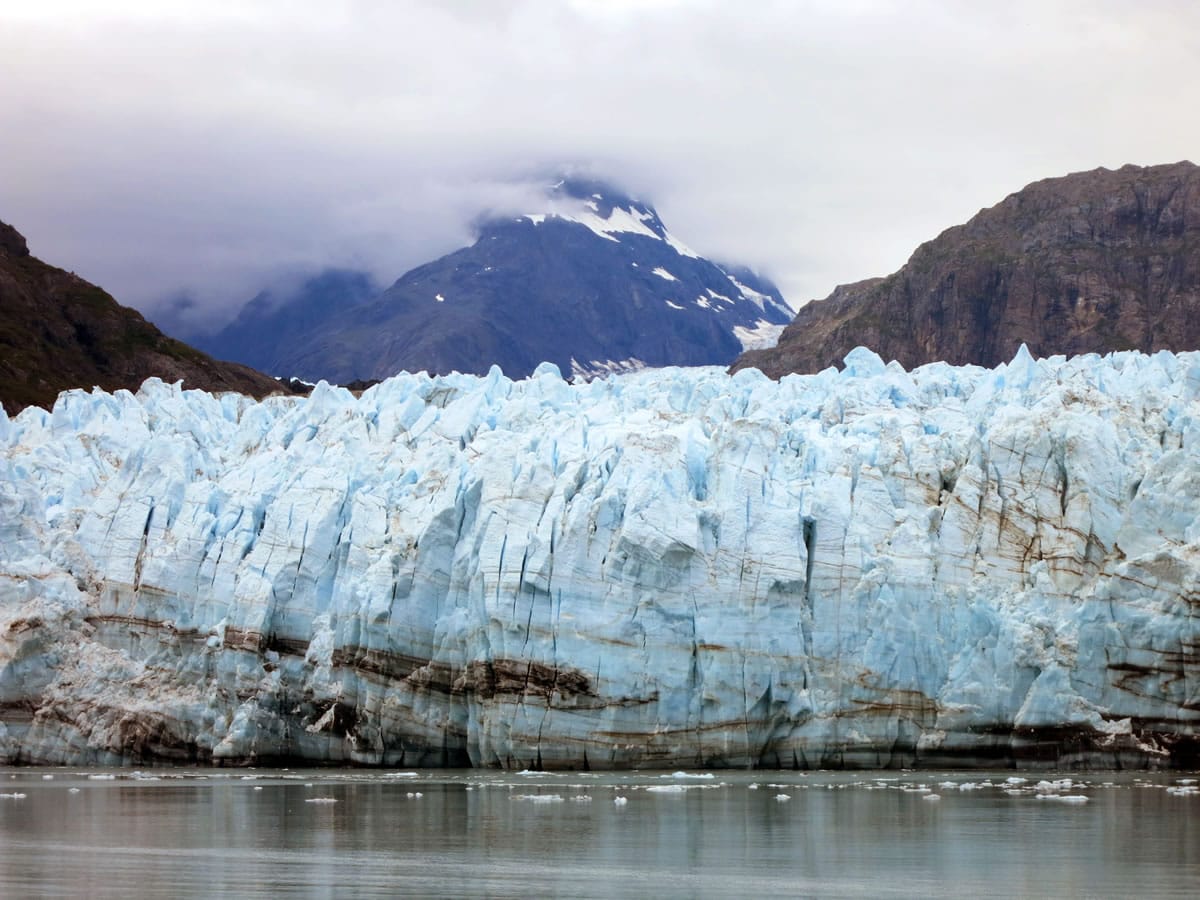 This July 30, 2014 photo shows Margerie Glacier, one of many glaciers that make up Alaska's Glacier Bay National Park. With melting glaciers and rising seas as his backdrop, President Barack Obama will visit Alaska next week to press for urgent global action to combat climate change, even as he carefully calibrates his message in a state heavily dependent on oil.