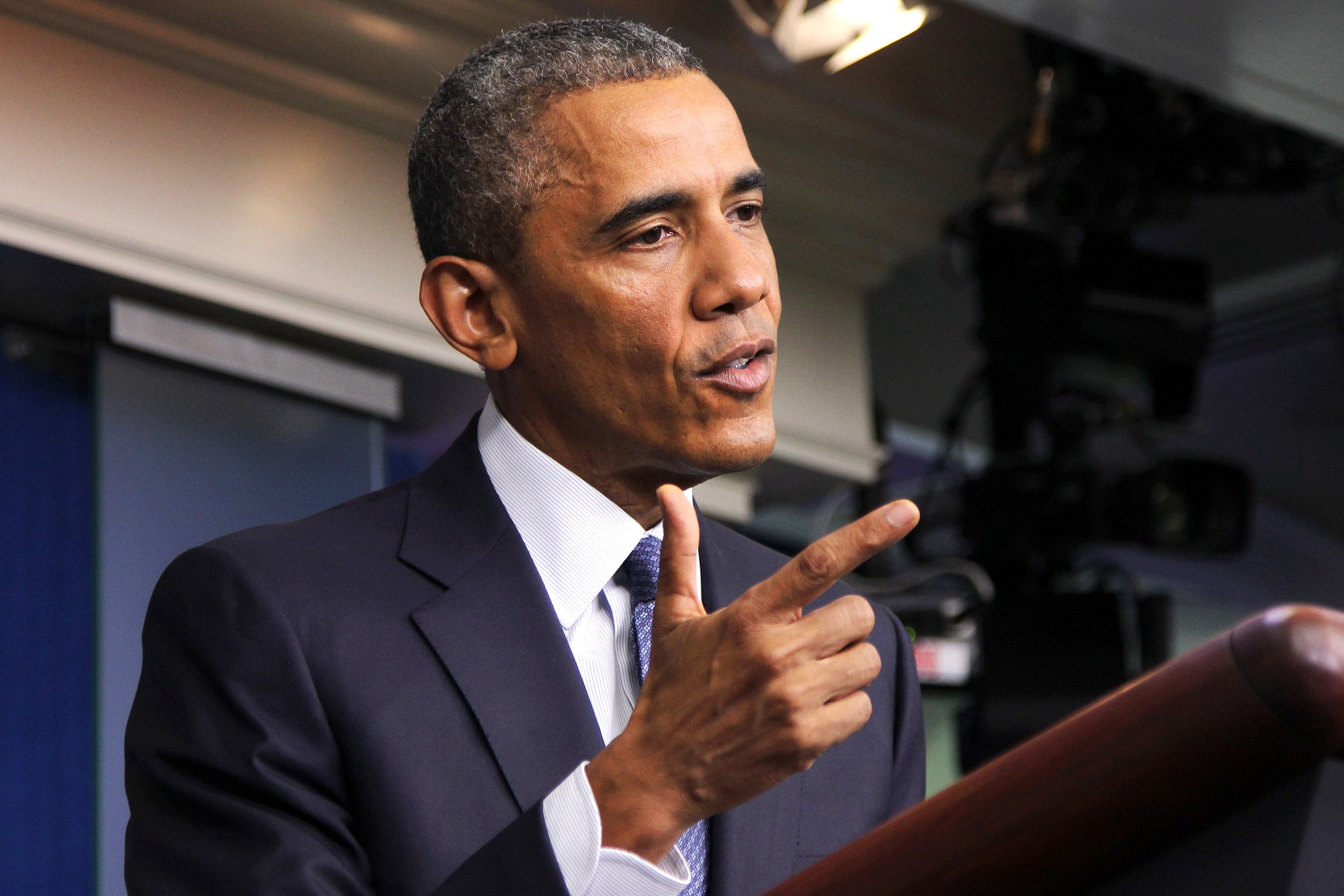 President Barack Obama speaks in the Brady Press Briefing Room of the White House in Washington, Friday, Aug. 1, 2014. The president spoke on various topics including the economy, immigration, Ukraine and the Middle East.