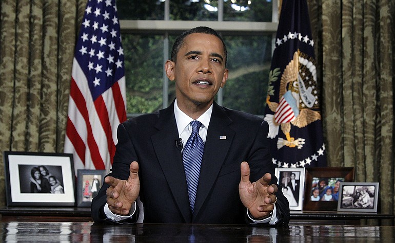 President Barack Obama delivers a televised address from the Oval Office of the White House in Washington, Tuesday.