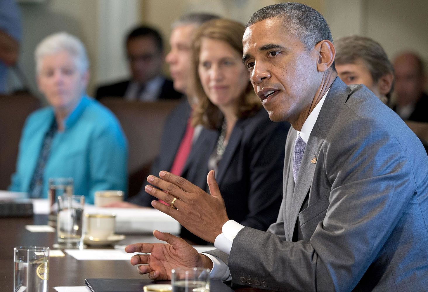 President Barack Obama speaks to the media during a meeting with his cabinet members in the Cabinet Room of the White House in Washington on Tuesday.